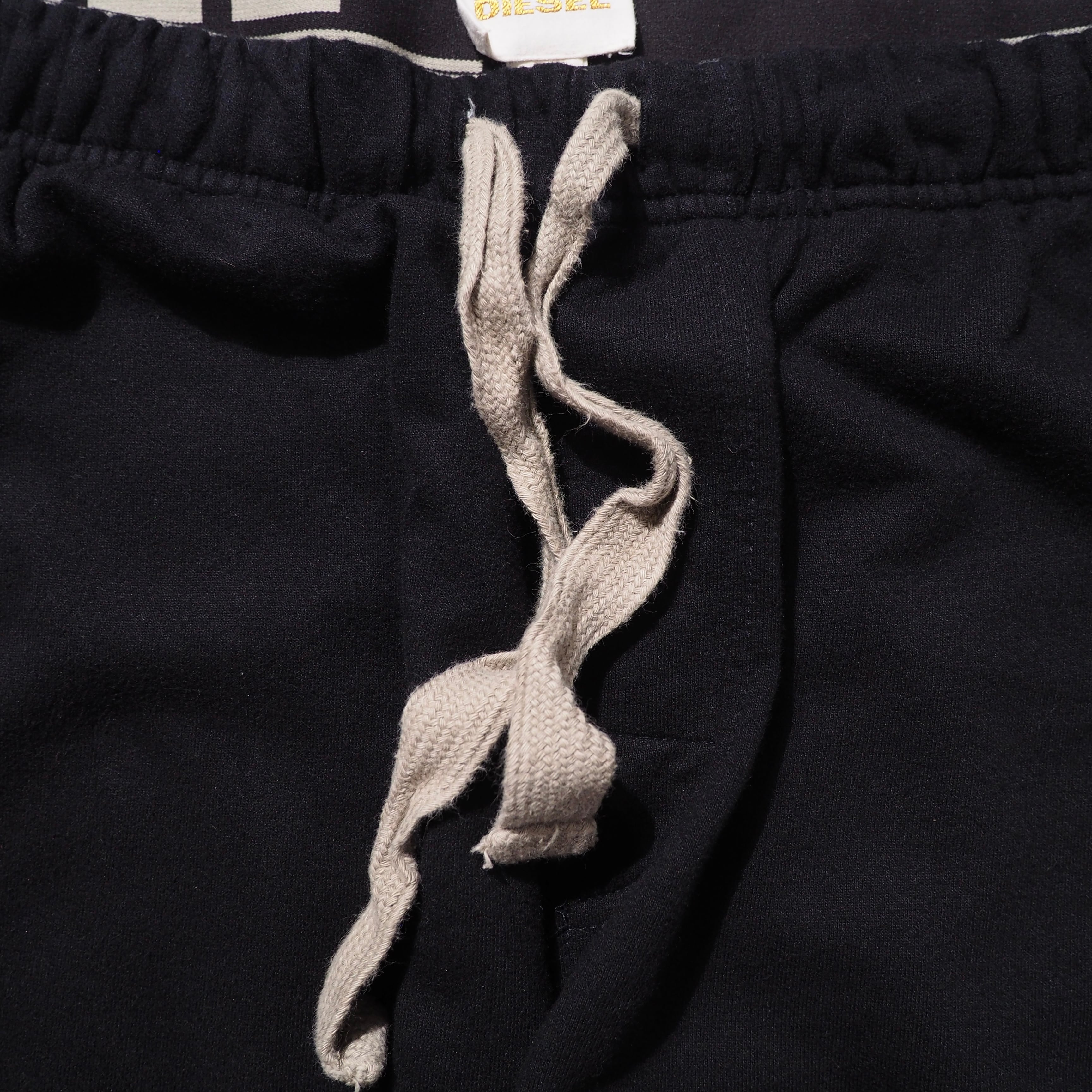 ” DIESEL ” Graphic logo printed wide Sweat pants