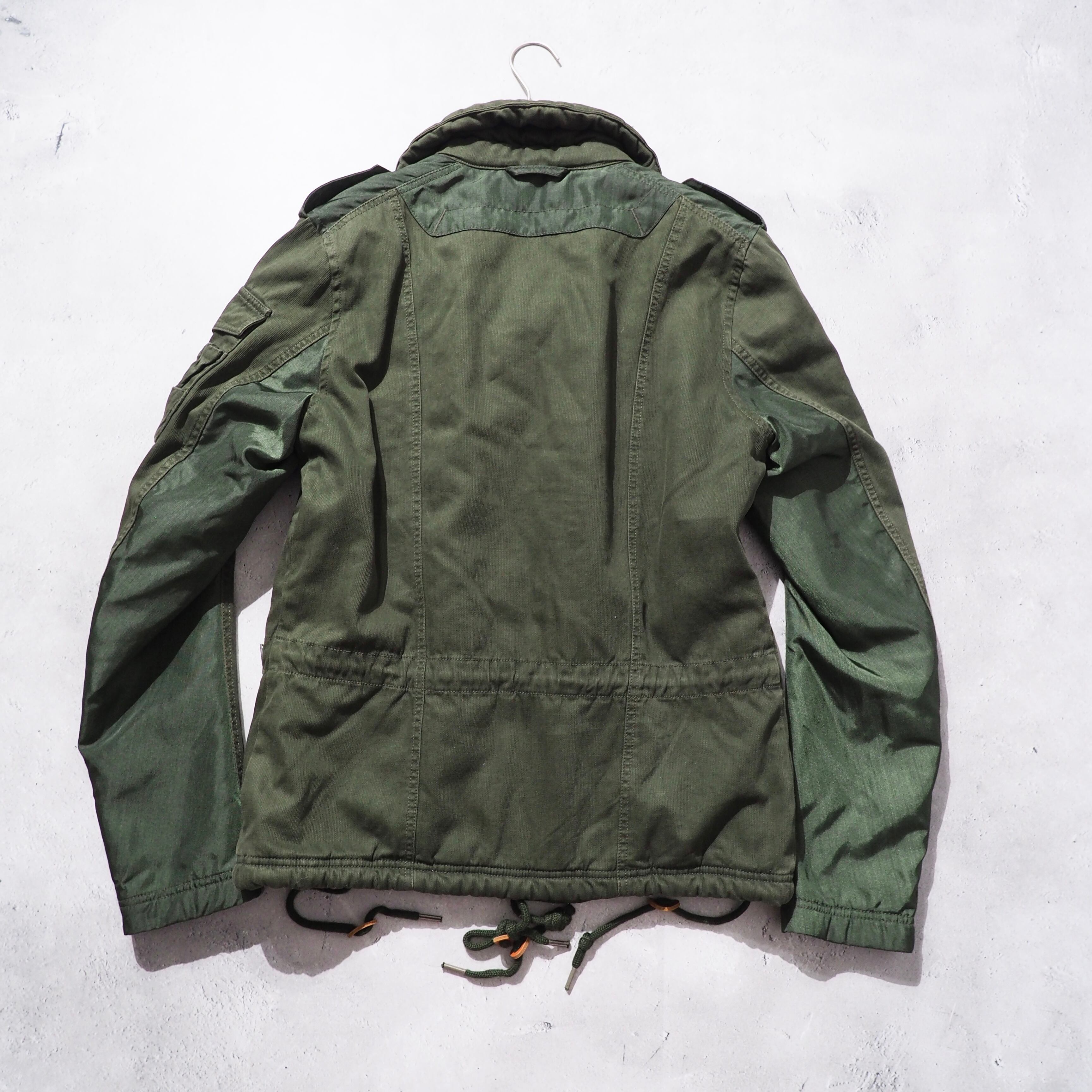 " DIESEL " Big Pockets × Switching nylon High neck Military jacket