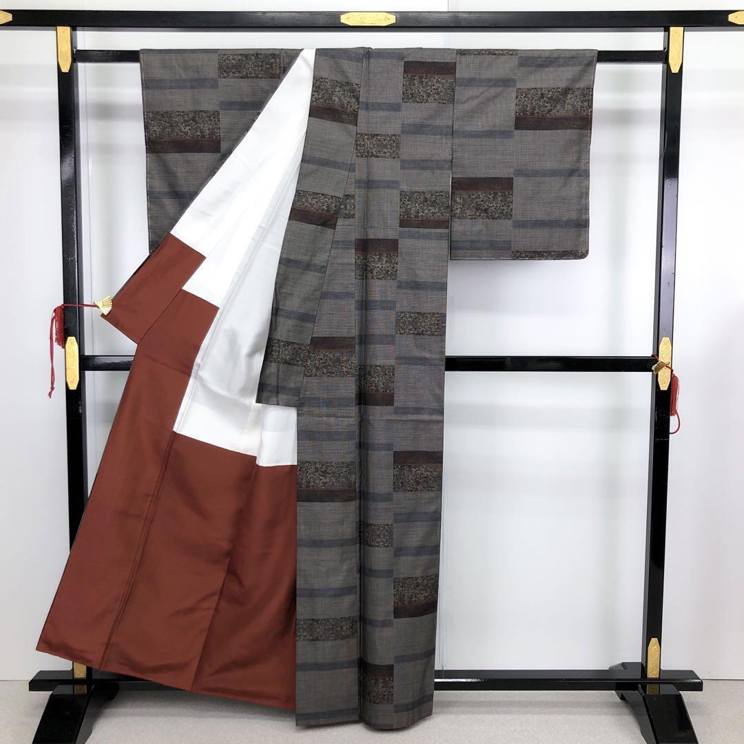 K-3046 本場大島紬 名匠たかし カタス7マルキ 茶泥染 横段織模様 証紙付 | リユース着物専門店 わびさび