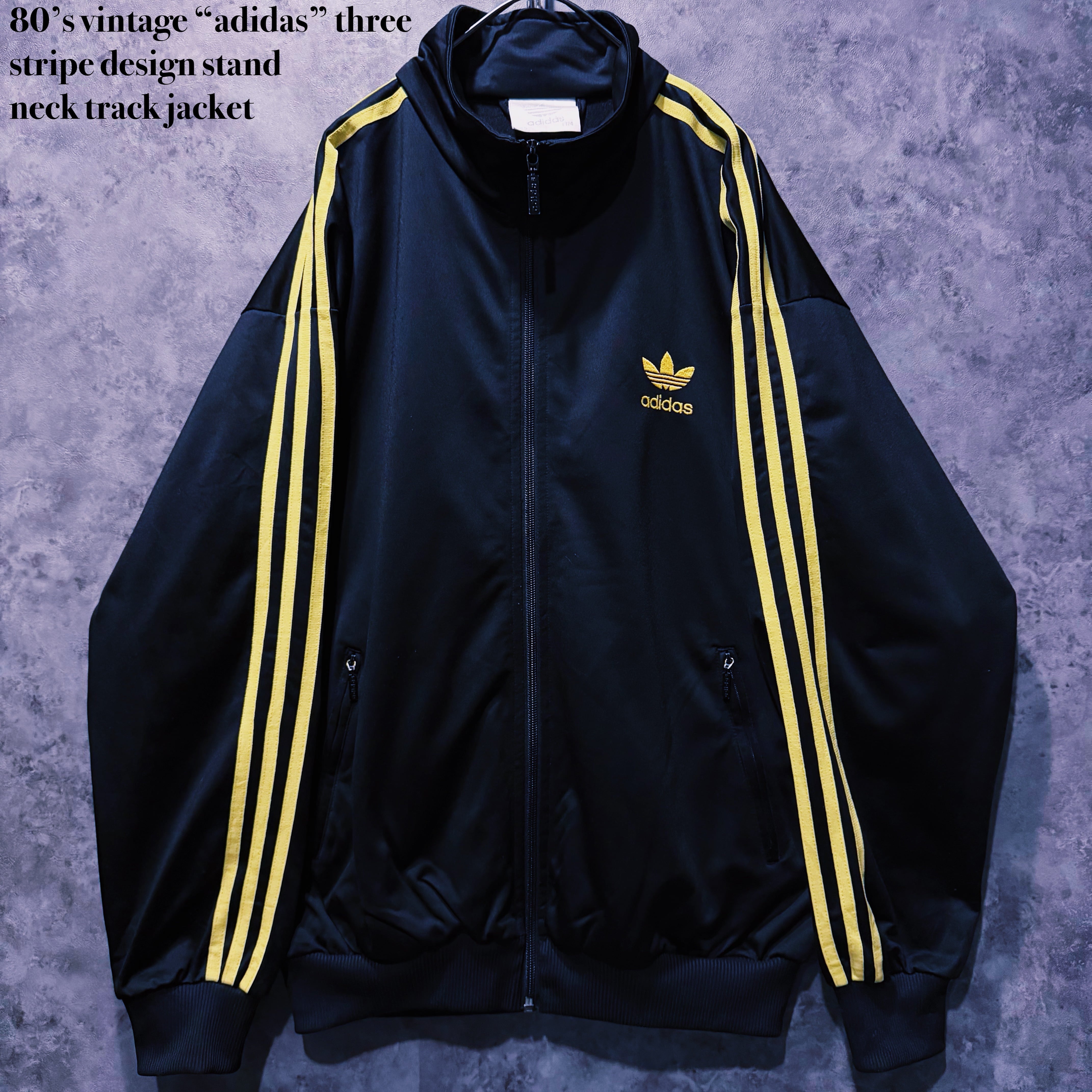 【doppio】80’s vintage “adidas” three stripe design stand neck track jacket