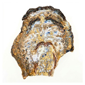 アラキドン　右下顎が欠けたが皿にされる像