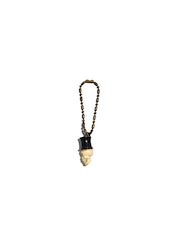 KEYCHAIN OF A SKULL WEARING A HAT
