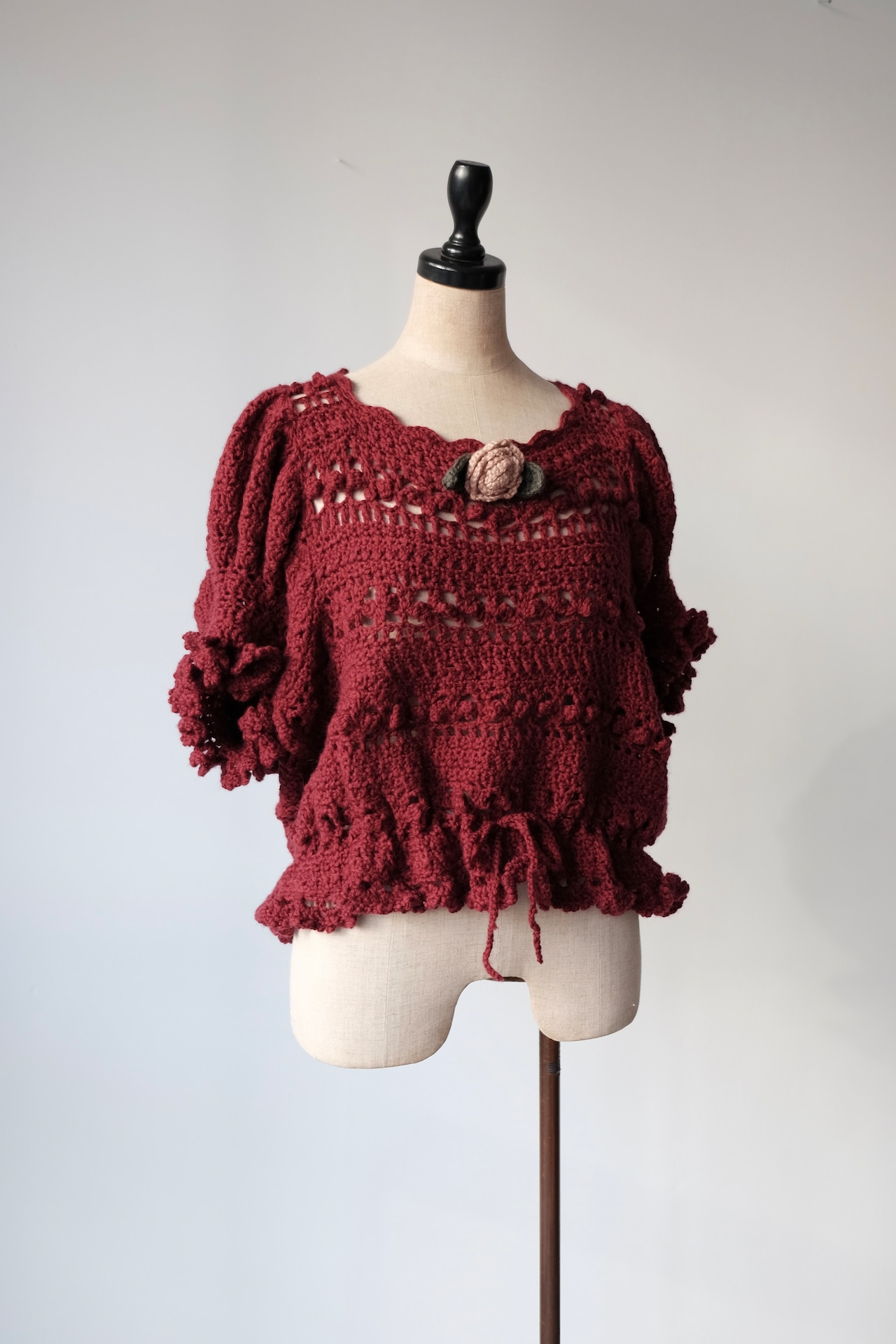 Crochet rose sweater