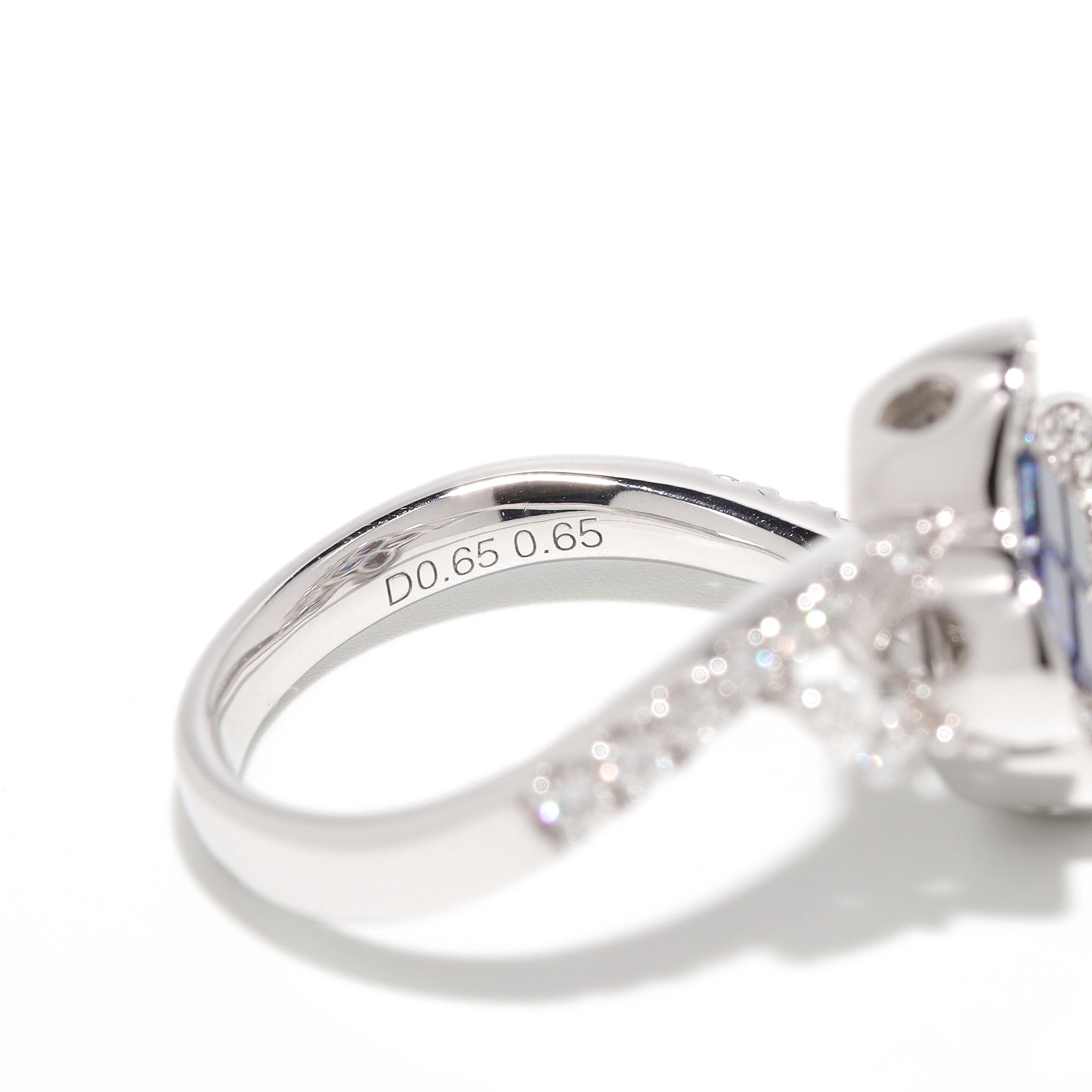 ミステリーセッティング サファイア リング K18(WG) / 0.650ct / DA