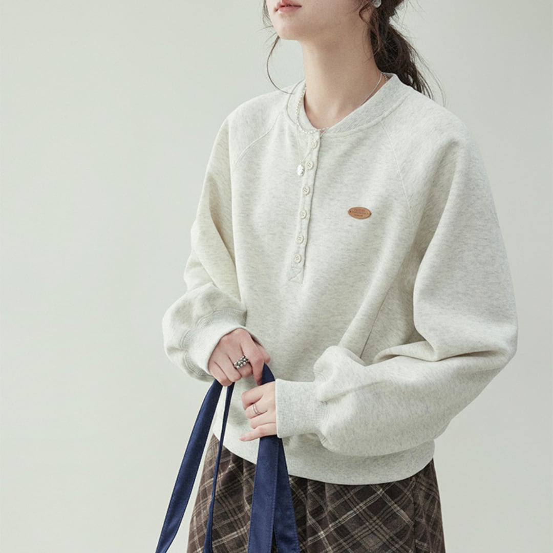 fleece pullover with button detail