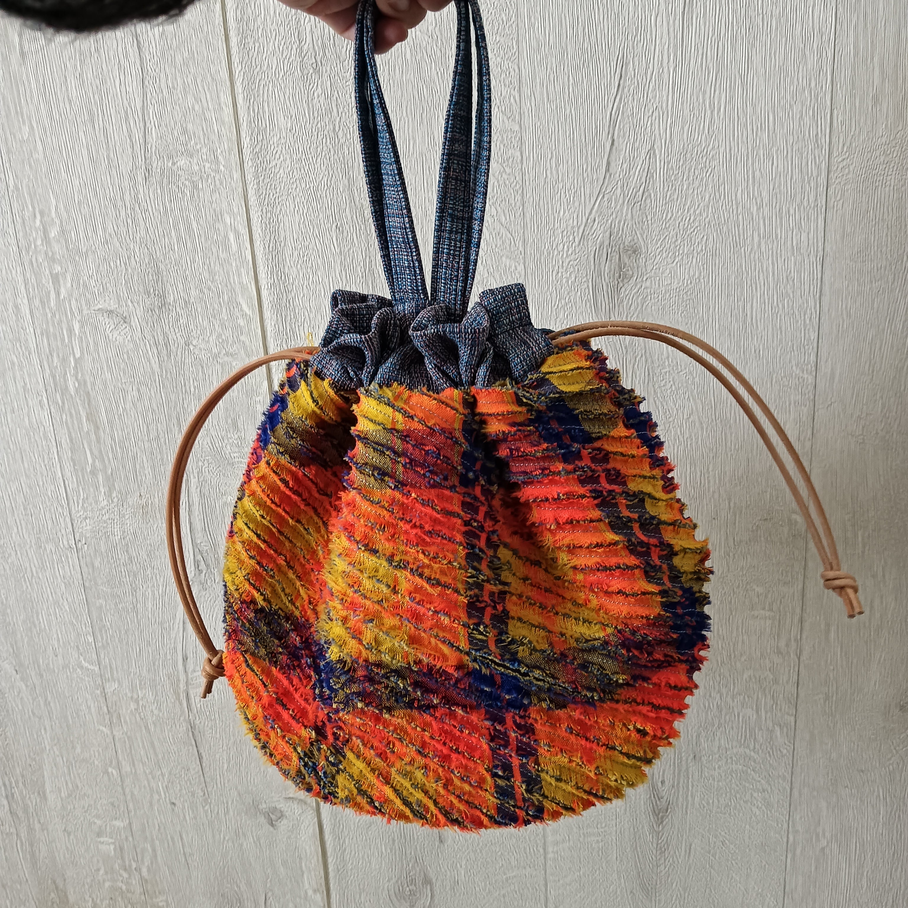 送料無料】Googly no.01／スラッシュキルトの巾着バッグ | sunao 革の