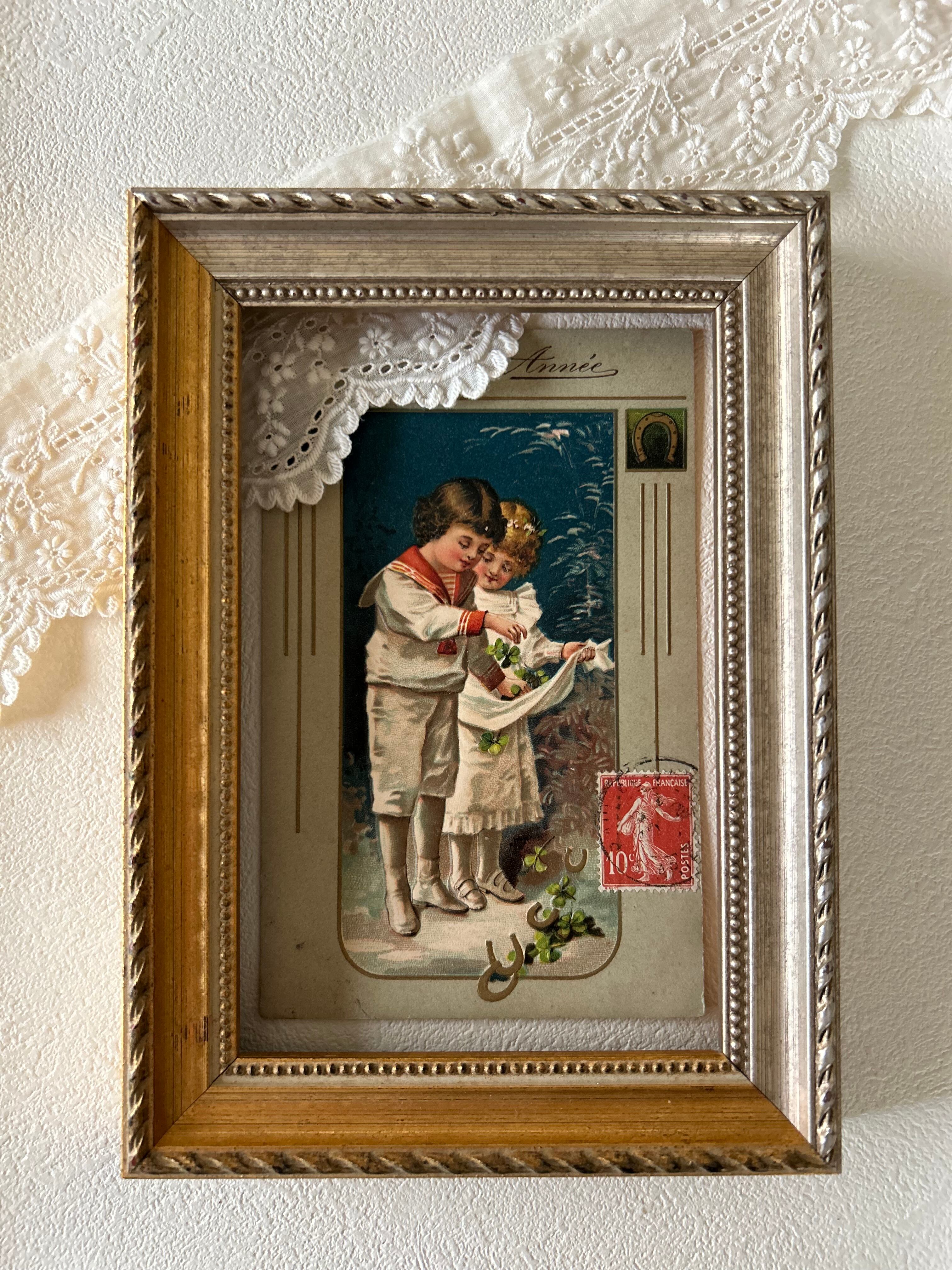 アンティークポストカード Heureuse Année ウール―ザネ ヴィクトリアン 馬蹄 四葉 子供 エンボス 額装 コレクション 新年 クリスマス