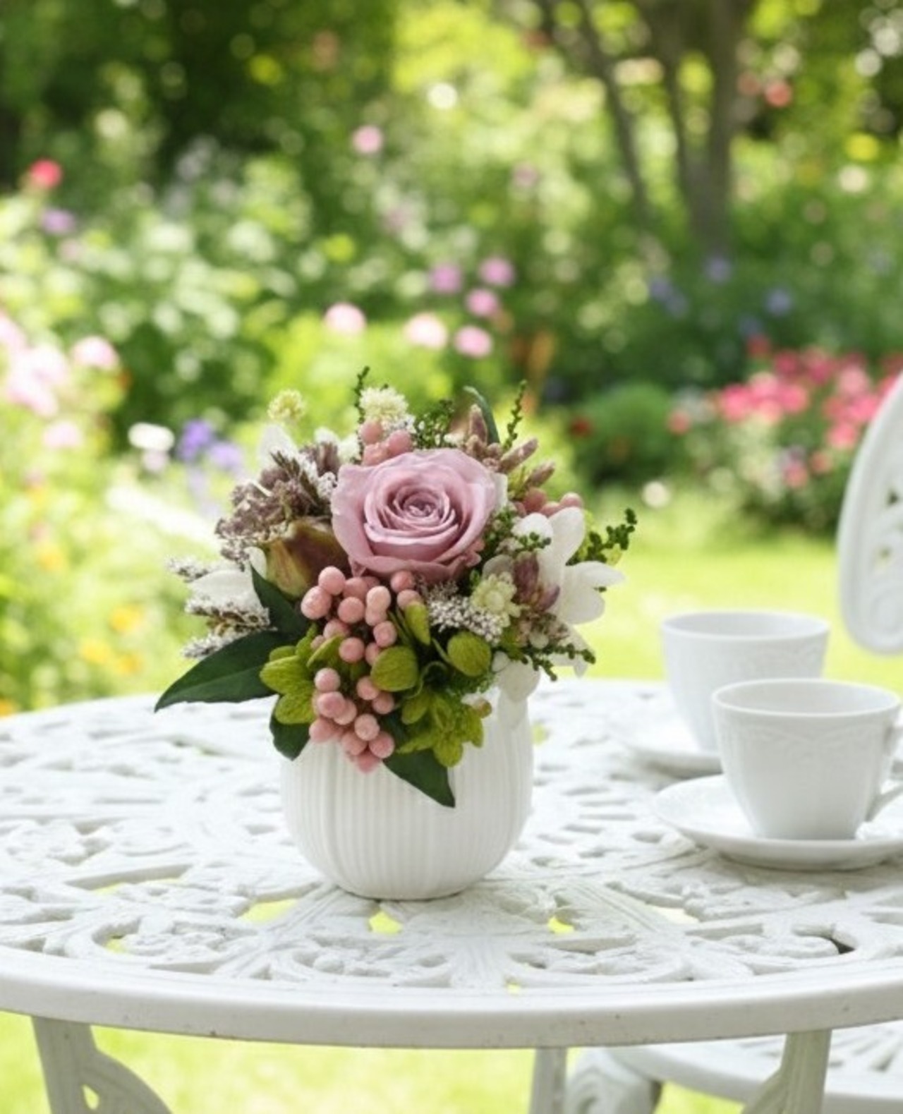 ミニバラと小花の小さなアレンジメント  Misty Pink