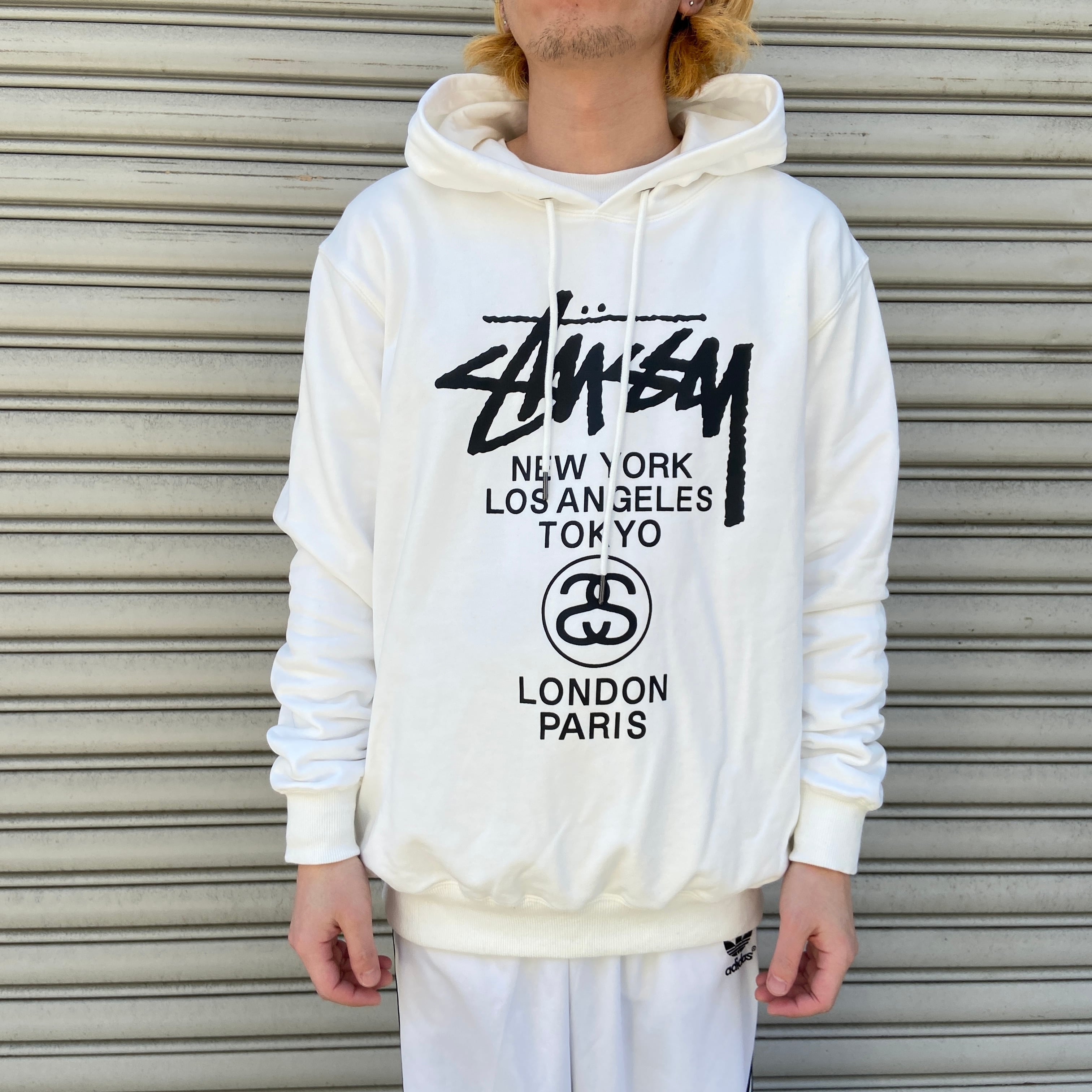 『送料無料』Stussy ステューシー ワールドツアー グラフィックロゴパーカー L USA | 古着屋 Uan powered by BASE