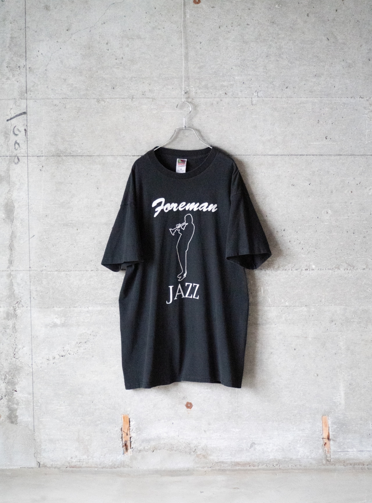 "Foreman" used Local jazz band t-shirt