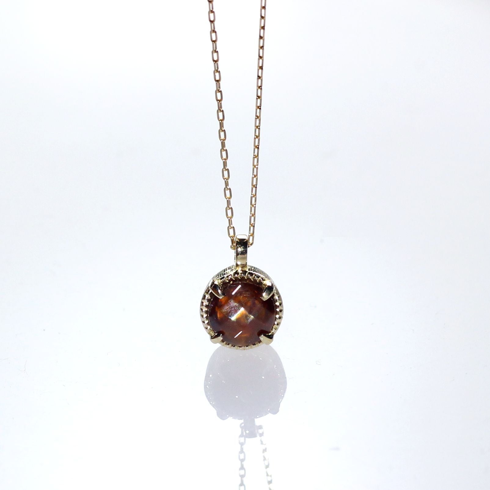《国産宝石》K18YG レインボーガーネットペンダント 0.92ct