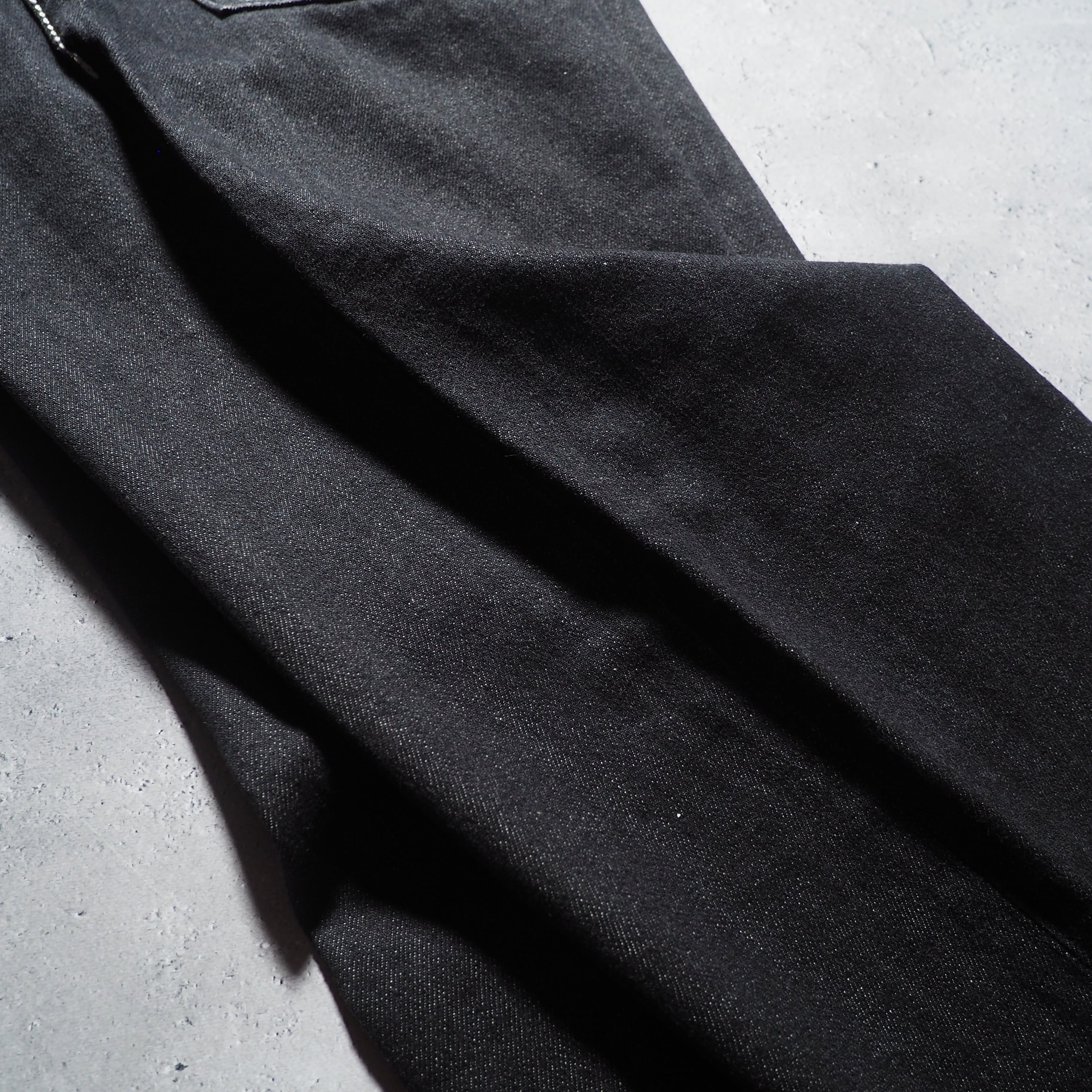 ” Montage ” Back logo painted Black loose Buggy Denim pants