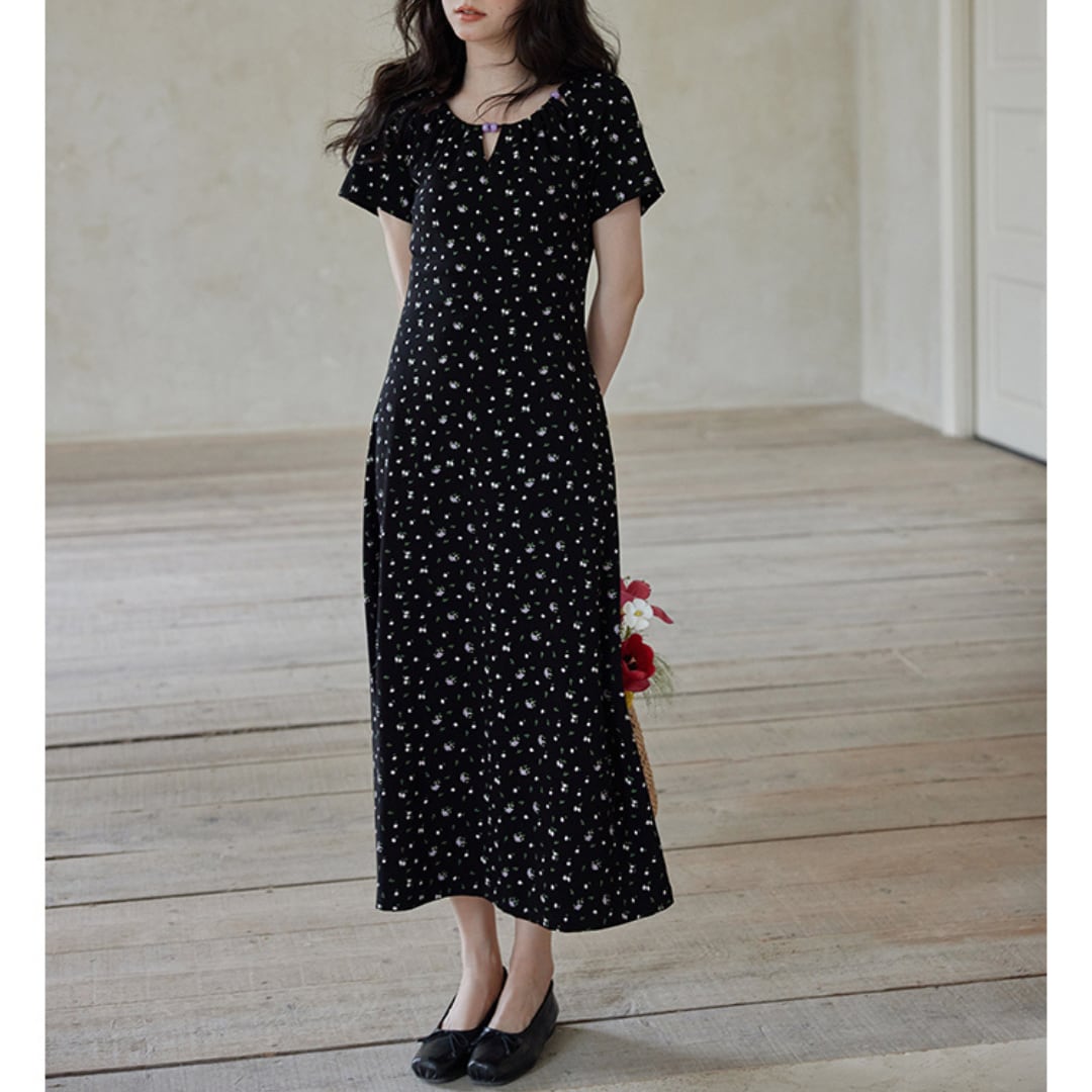 black dress with tiny floral pattern