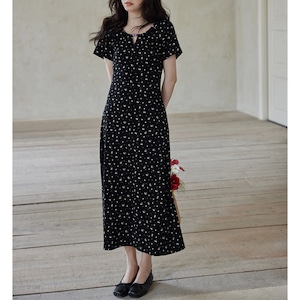 black dress with tiny floral pattern