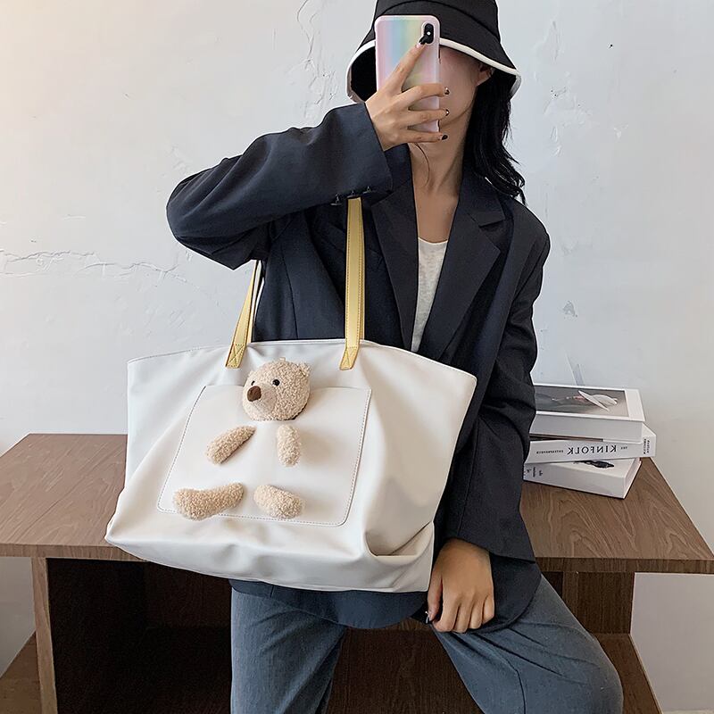 シンプルで大容量のショルダーバッグレディースバッグ2020新しいトレンドファッションキャンバスハンドバッグネットレッドレディーストートバッグ Tiancai_Wing_Bag7007285