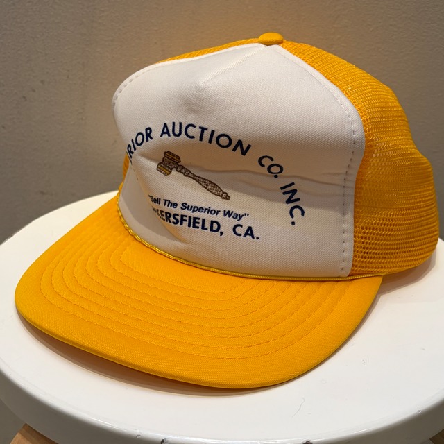 1990s SUPERIOR AUCTIOIN CO.INK CAP YELLOW