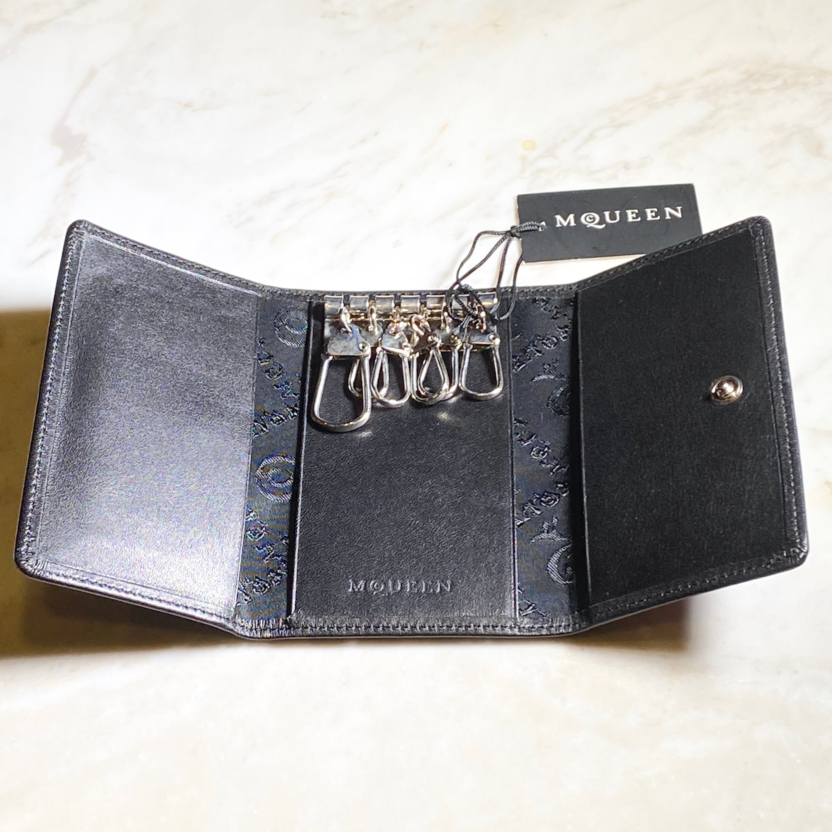 ALEXANDER McQUEEN rose curving key-case | NOIR ONLINE