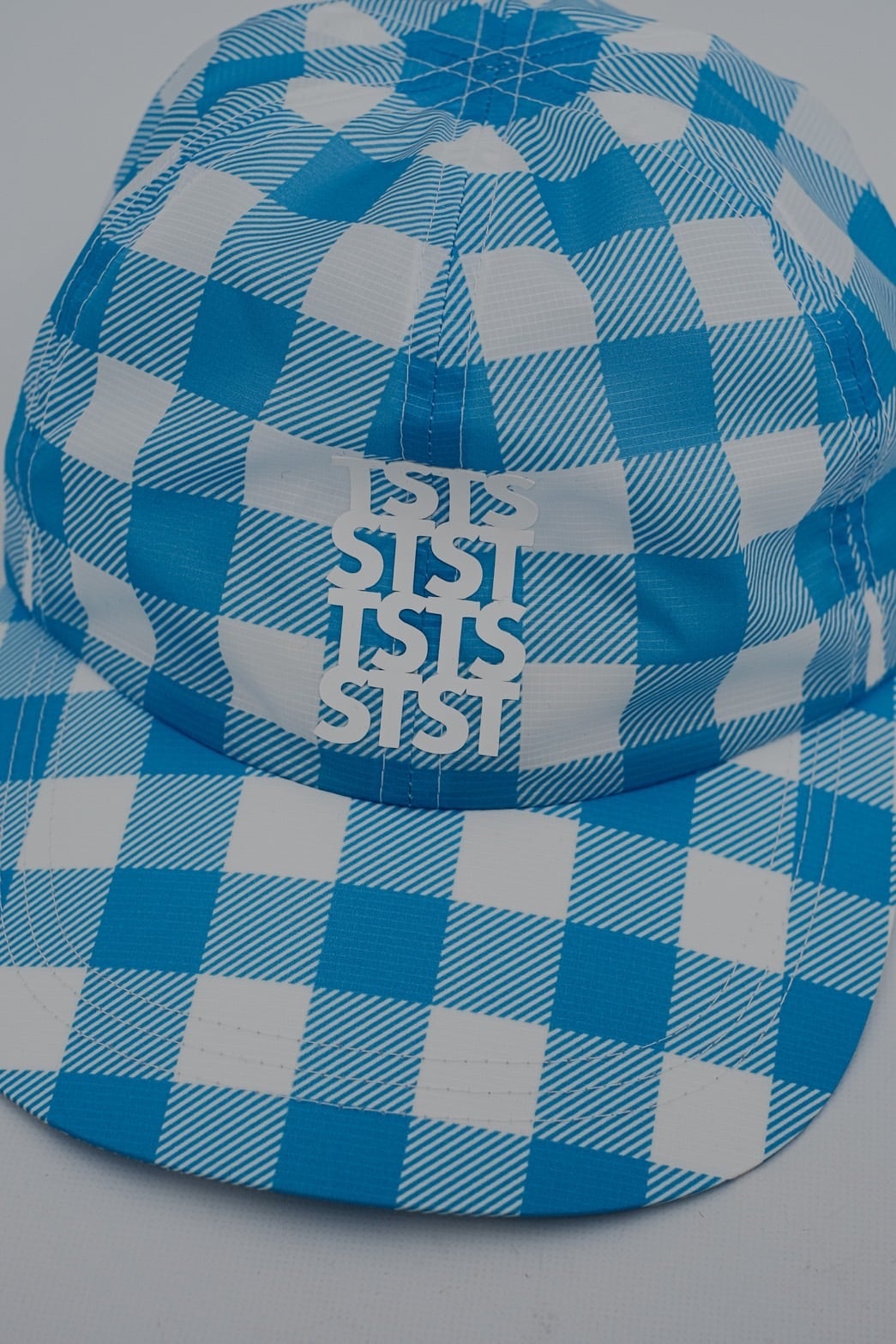 TSTS】RECYCLED POLYESTER DRAWSTRING CAP | puzzle