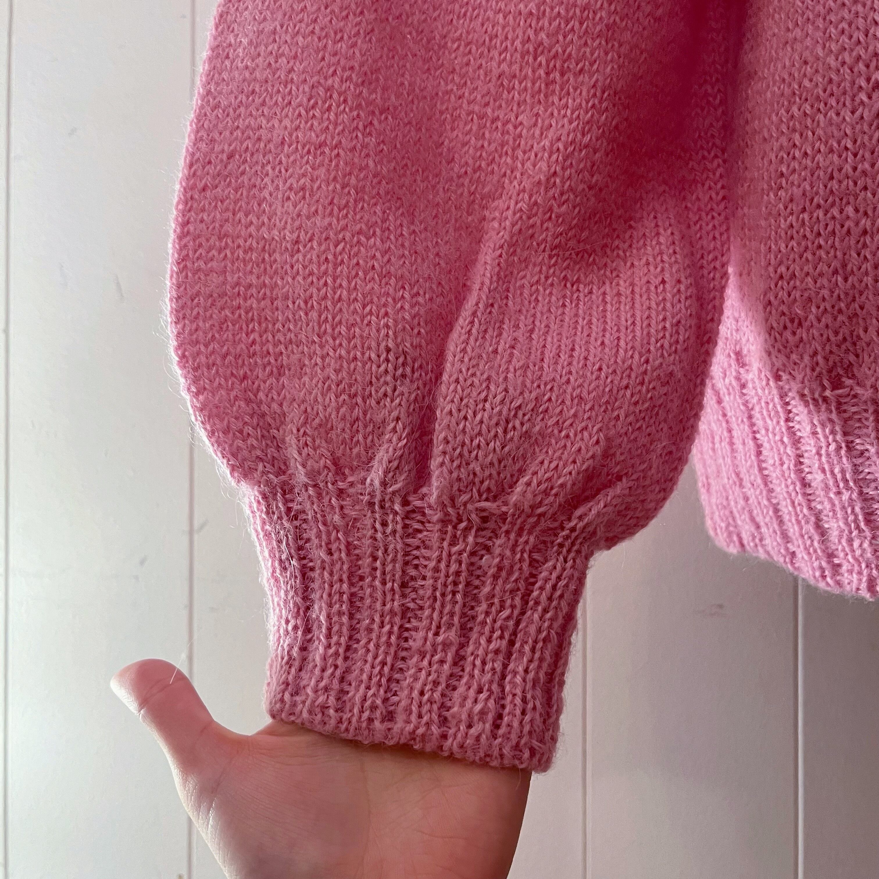 pink openwork knit sweater