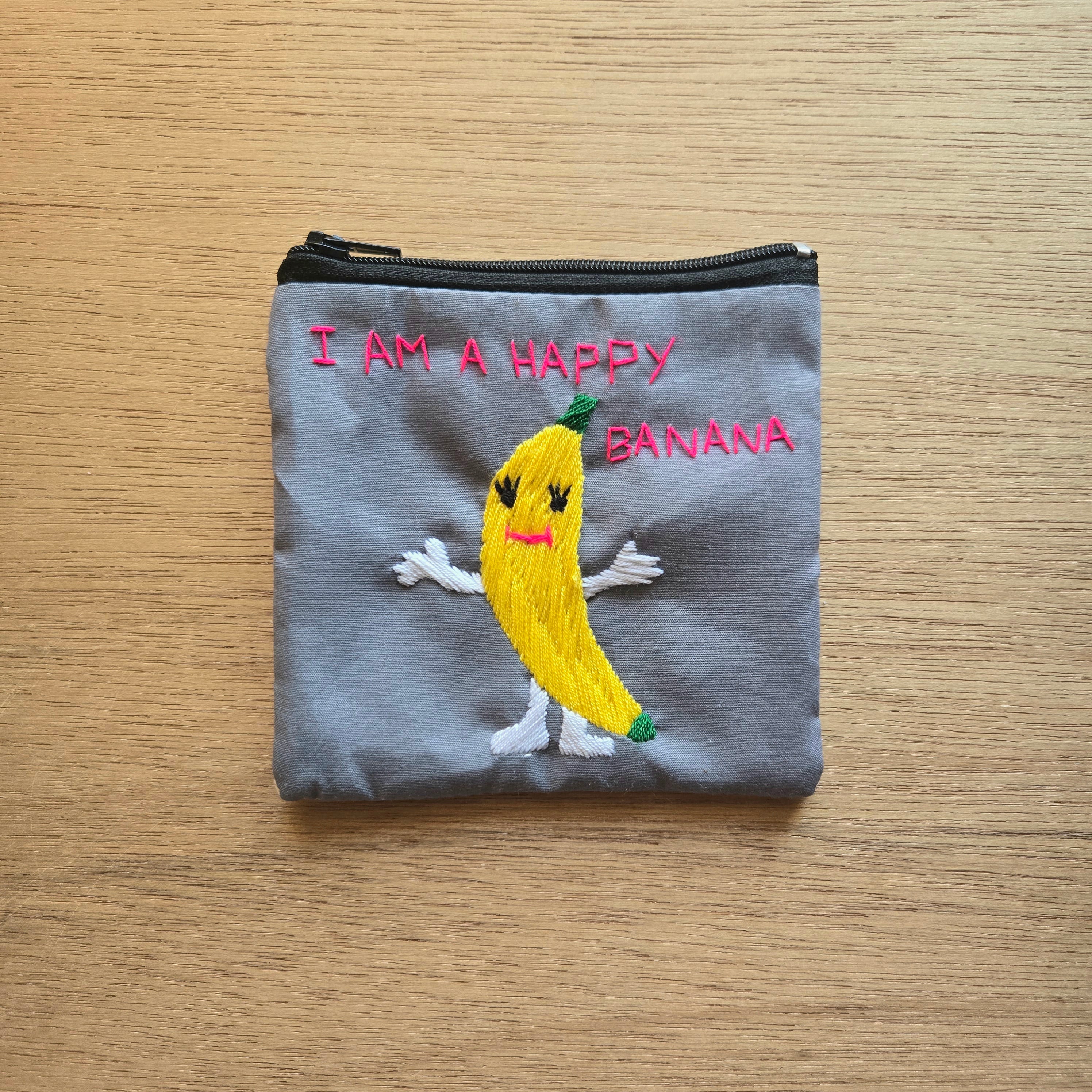ラオス チャーリーさんのゆる手刺繍ポーチS | gururi