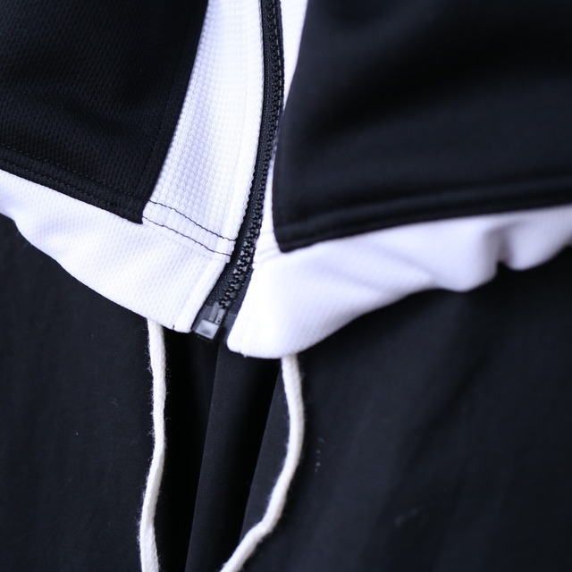 "black×white" tech design over silhouette track jacket