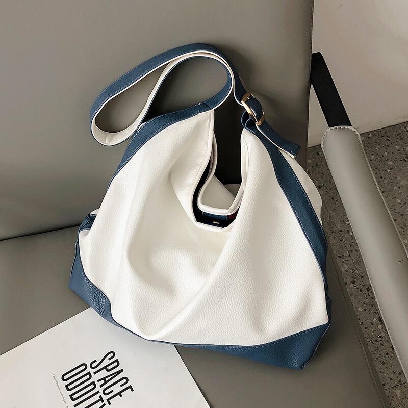 シンプルな大容量バッグ2020新しい流行のファッションシンプルなコントラストシングルショルダーバッグネットレッドワイルドクロスボディトートバッグ Tiancai_Wing_Bag6614100