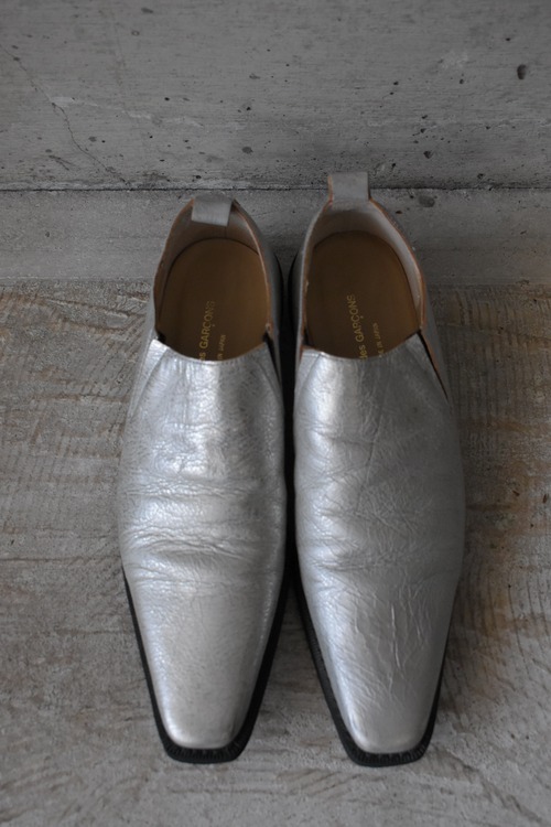 Silver pointed-toe shoes