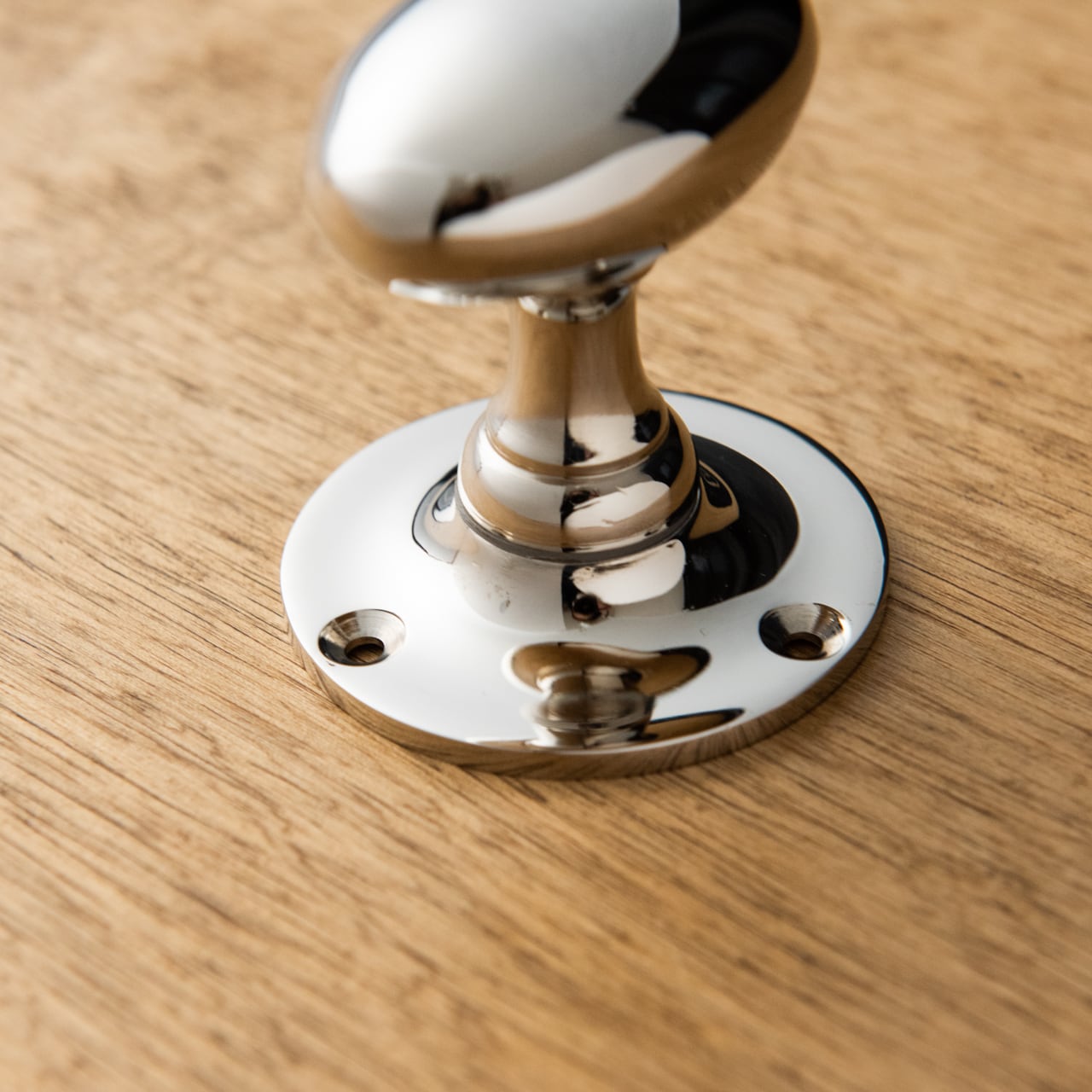 楕円持ち手・丸座ドアノブ 銀 | PASSAGE DUVE