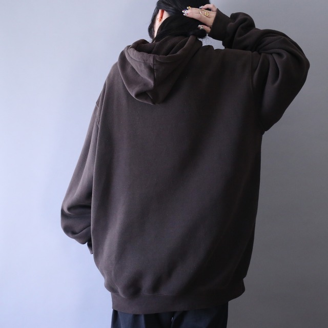 "carhartt" sleeve printed design over silhouette brown parka