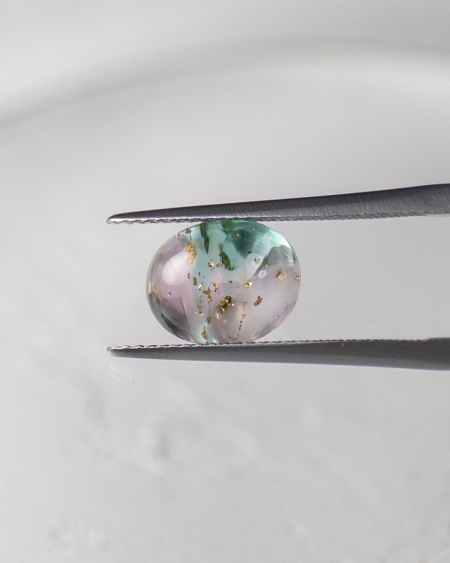 バフトップオーバルカット10×8mm #615【硝子の宝石】箔入