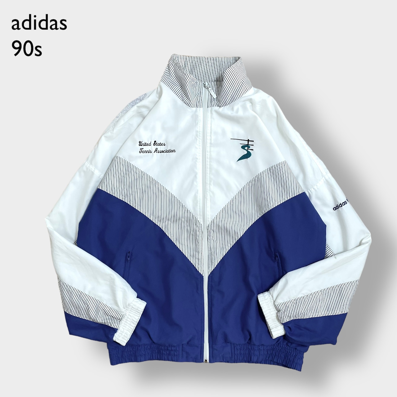 【adidas】90s トラックジャケット ジャンパー ブルゾン 刺繍ロゴ フルジップ バックプリント 切替 銀タグ 万国旗タグ アディダス US古着