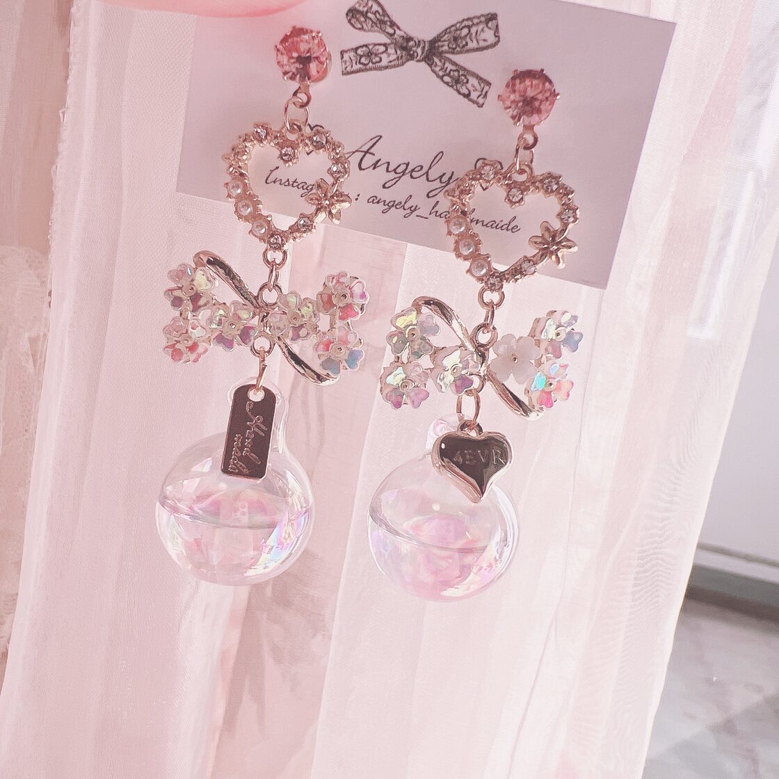 ビジューリボンハートイヤリング【JUNO kids】 | 【公式】MUK ONLINE SHOP｜人気アクセサリー・ジュエリー通販