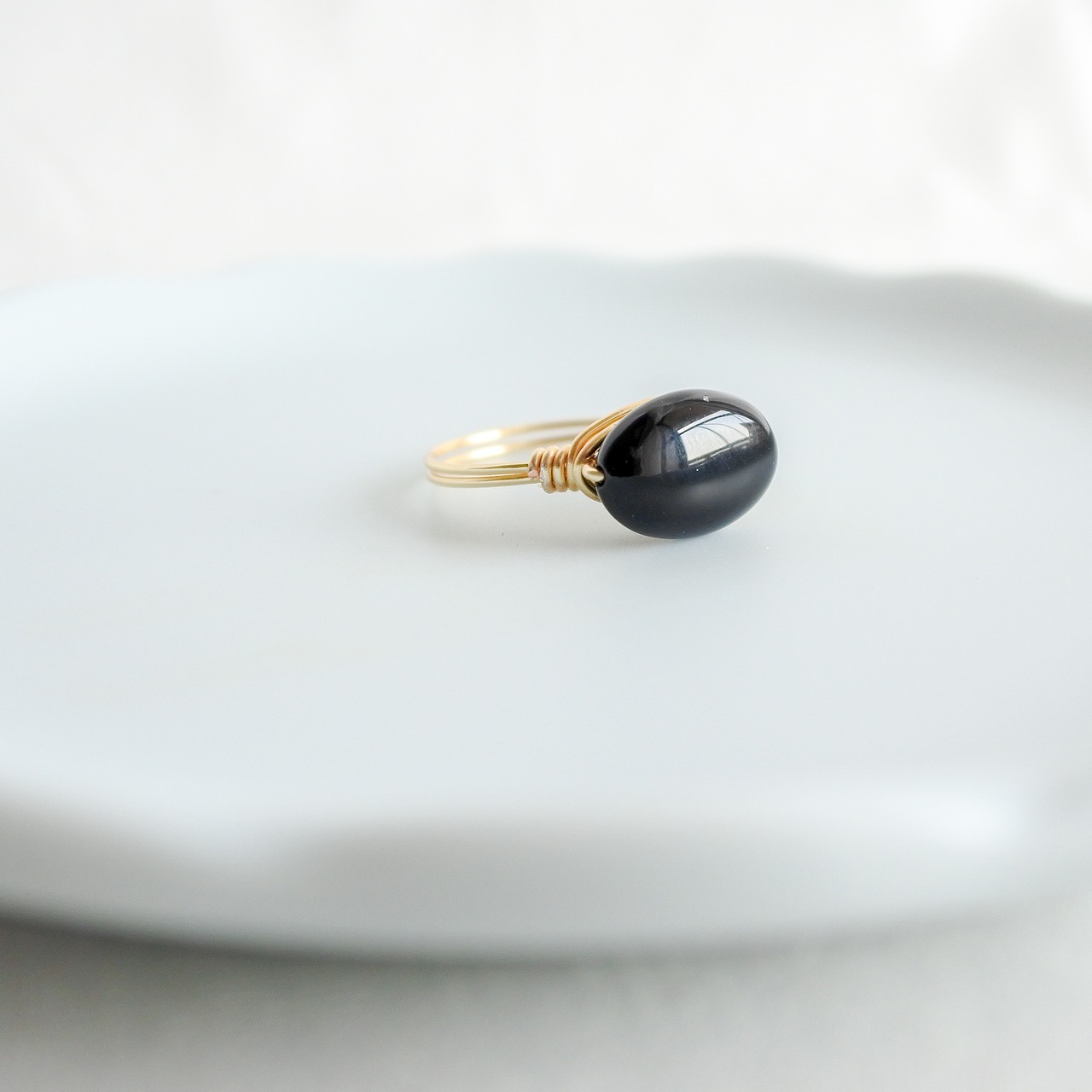 オニキス　だえん　ゴールドの指輪