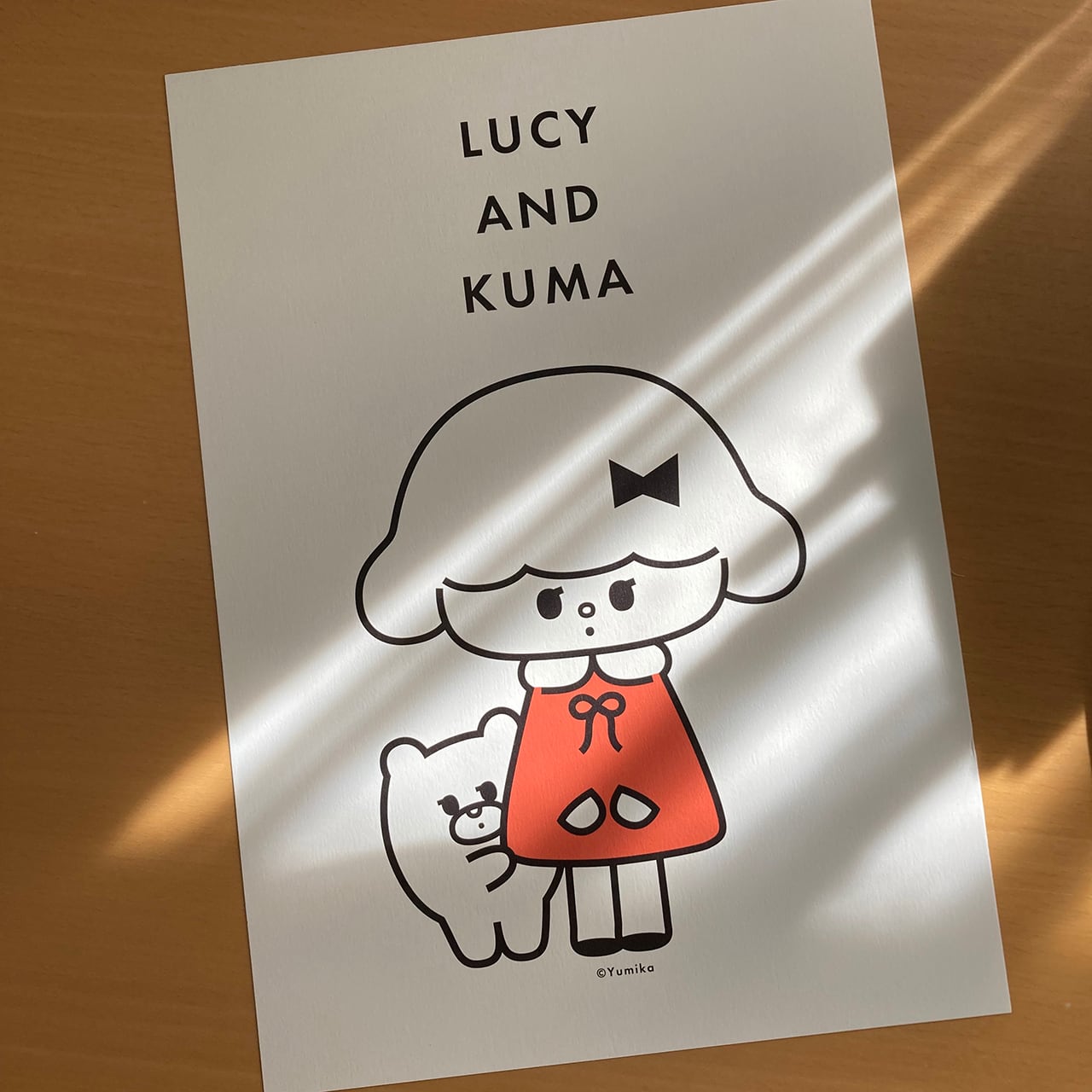 A4サイズポスター「LUCY AND KUMA」