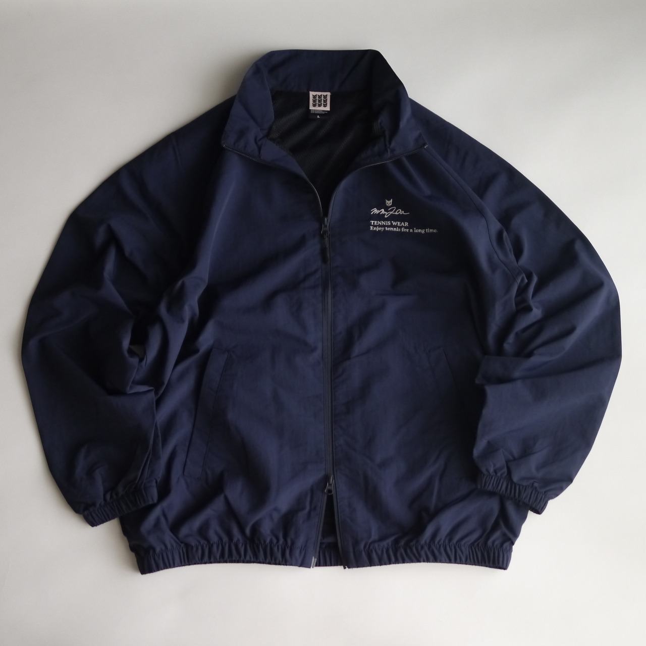 Slogan.コットンライクナイロンジャケット_ネイビー