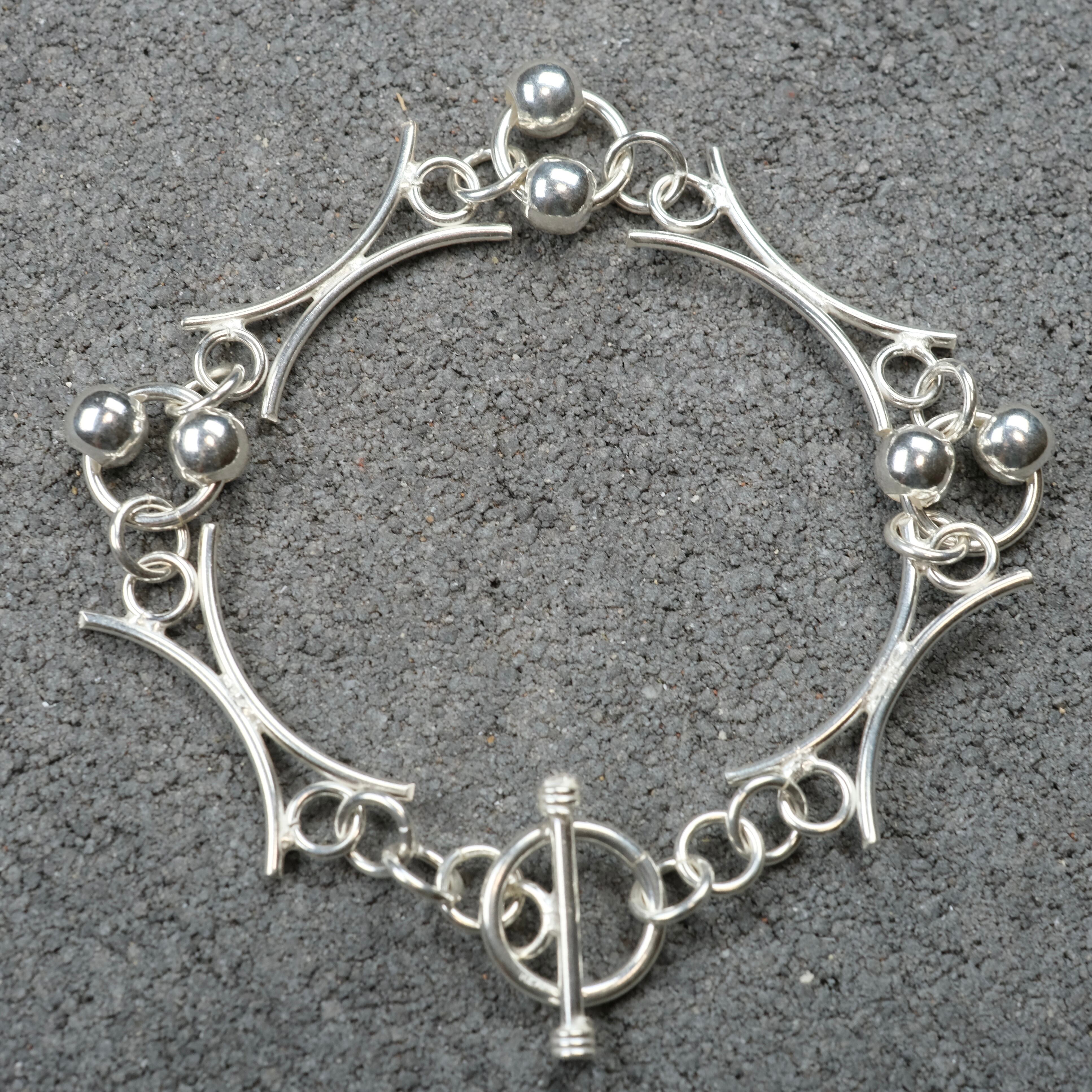 メキシコ タスコ製 TAXCO シルバー925 ユニークデザインブレスレット/軽研磨仕上げ