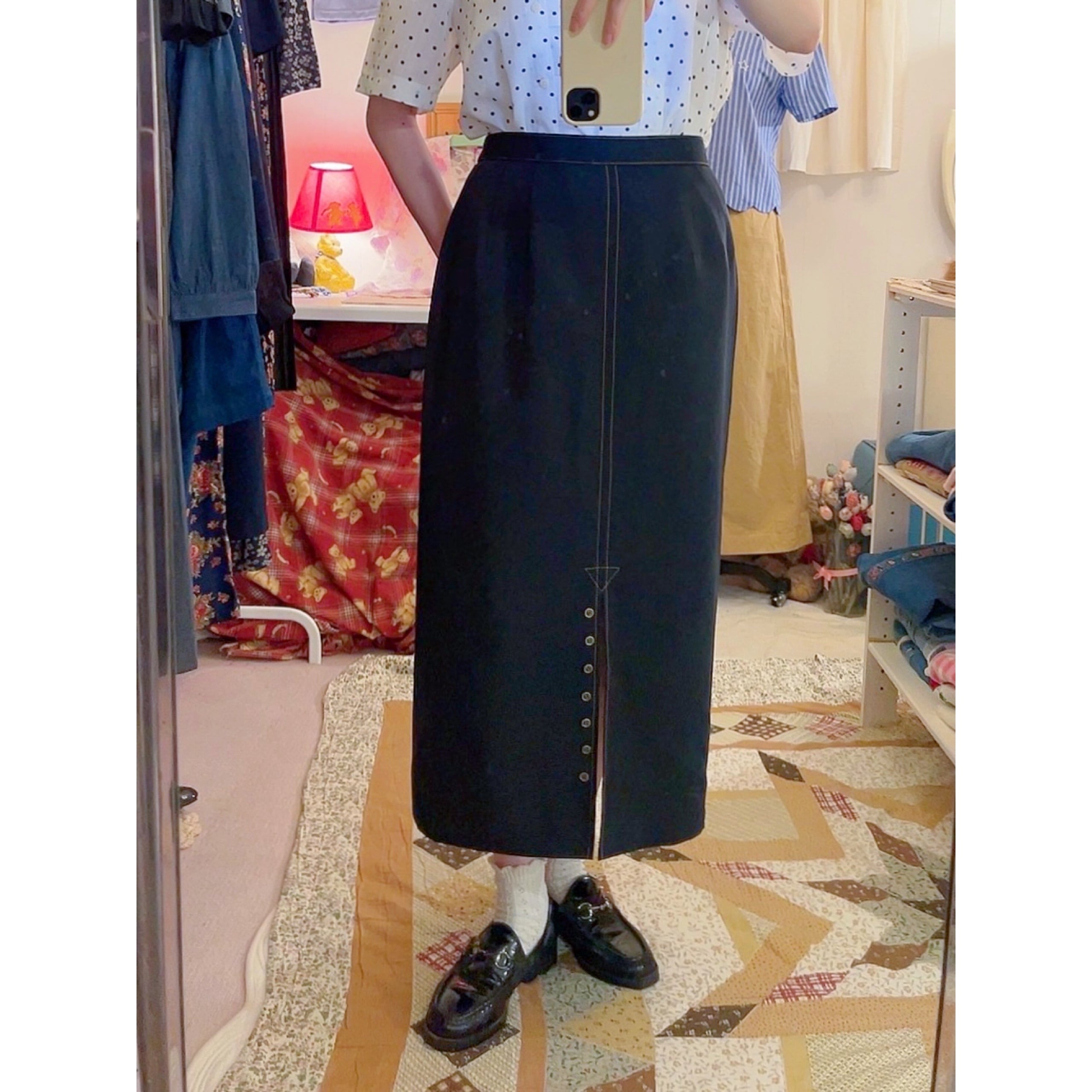 front slit button black skirt