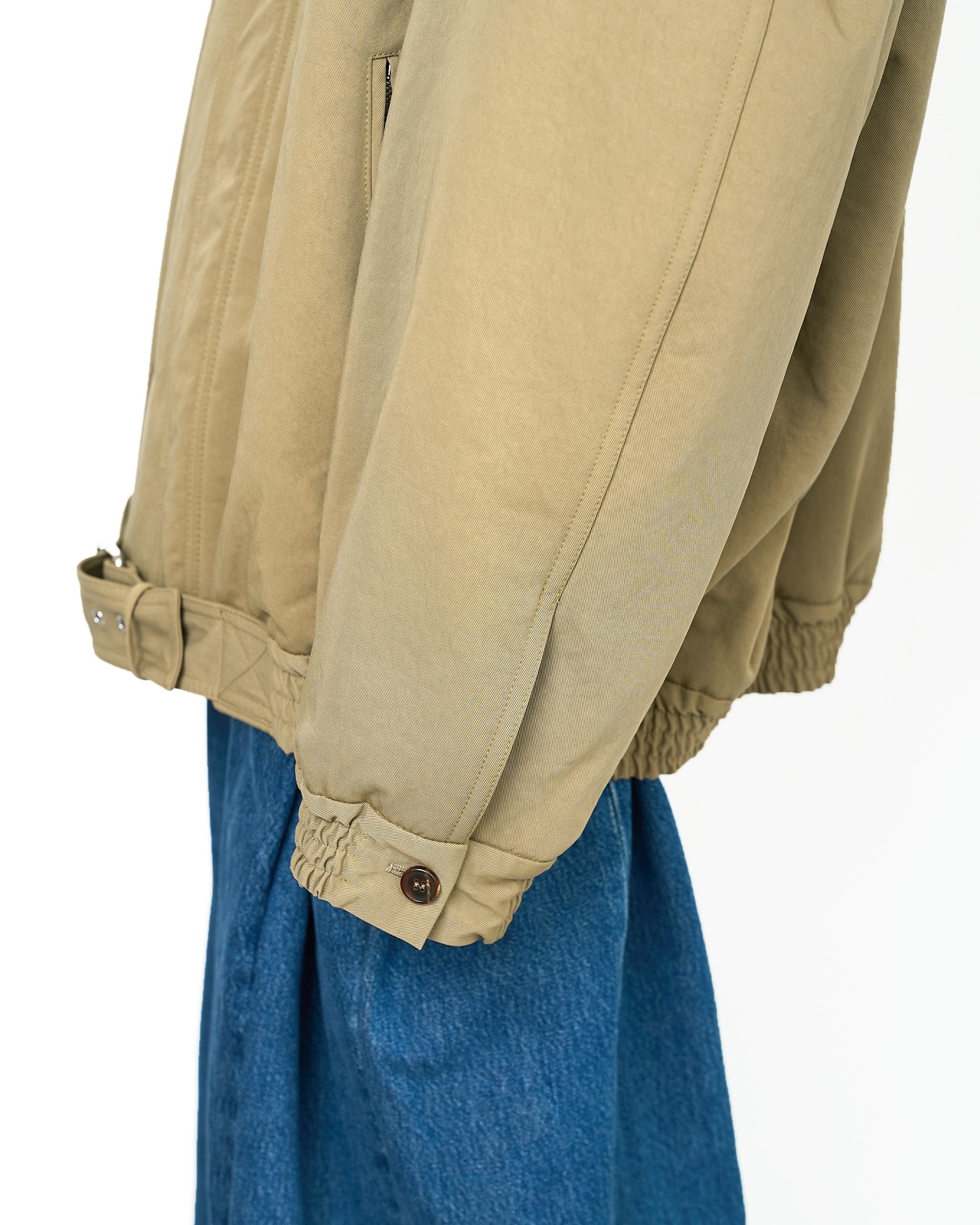 HED MAYNER "HIGH NECK ZIP UP BLOUSON 〔KHAKI〕"