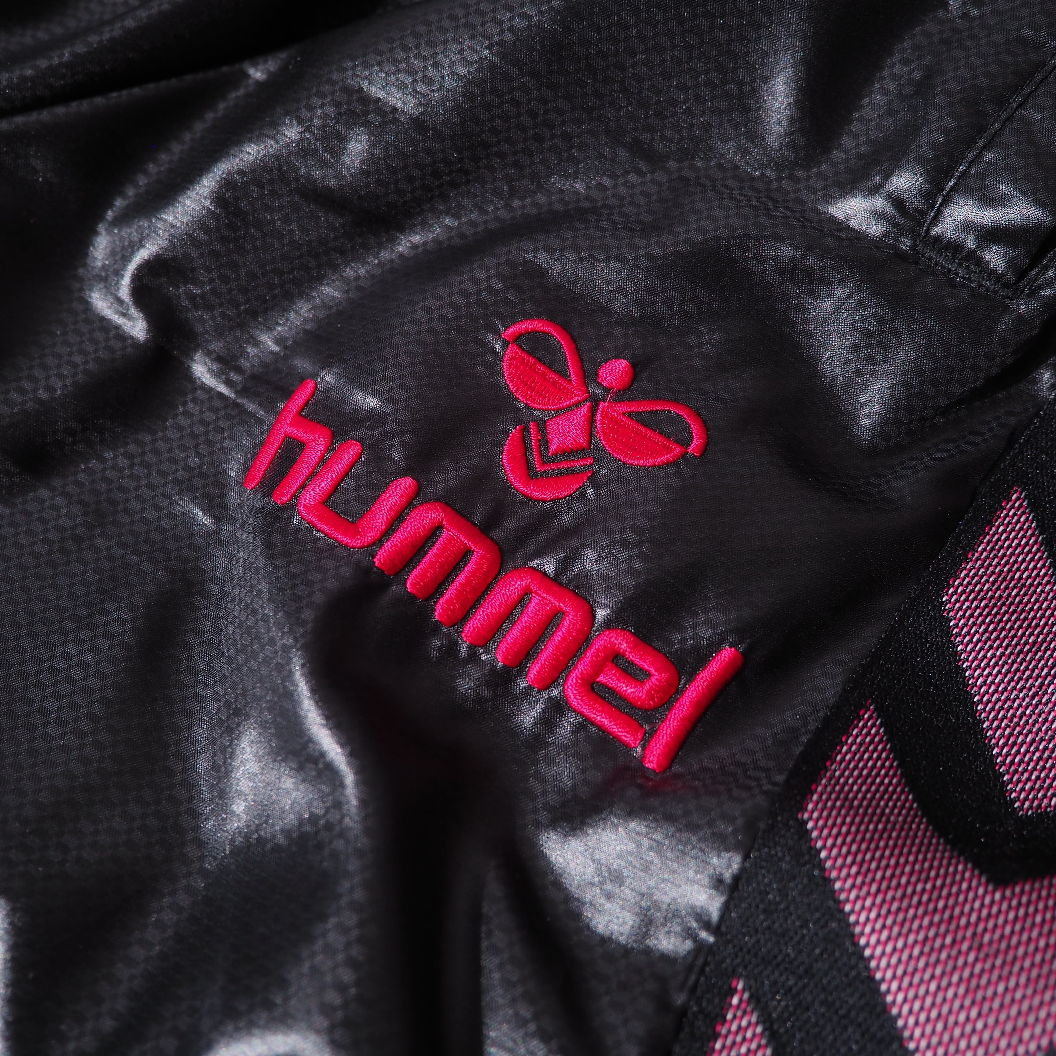 ” hummel ” arrow line × logo embroidery track gross pants