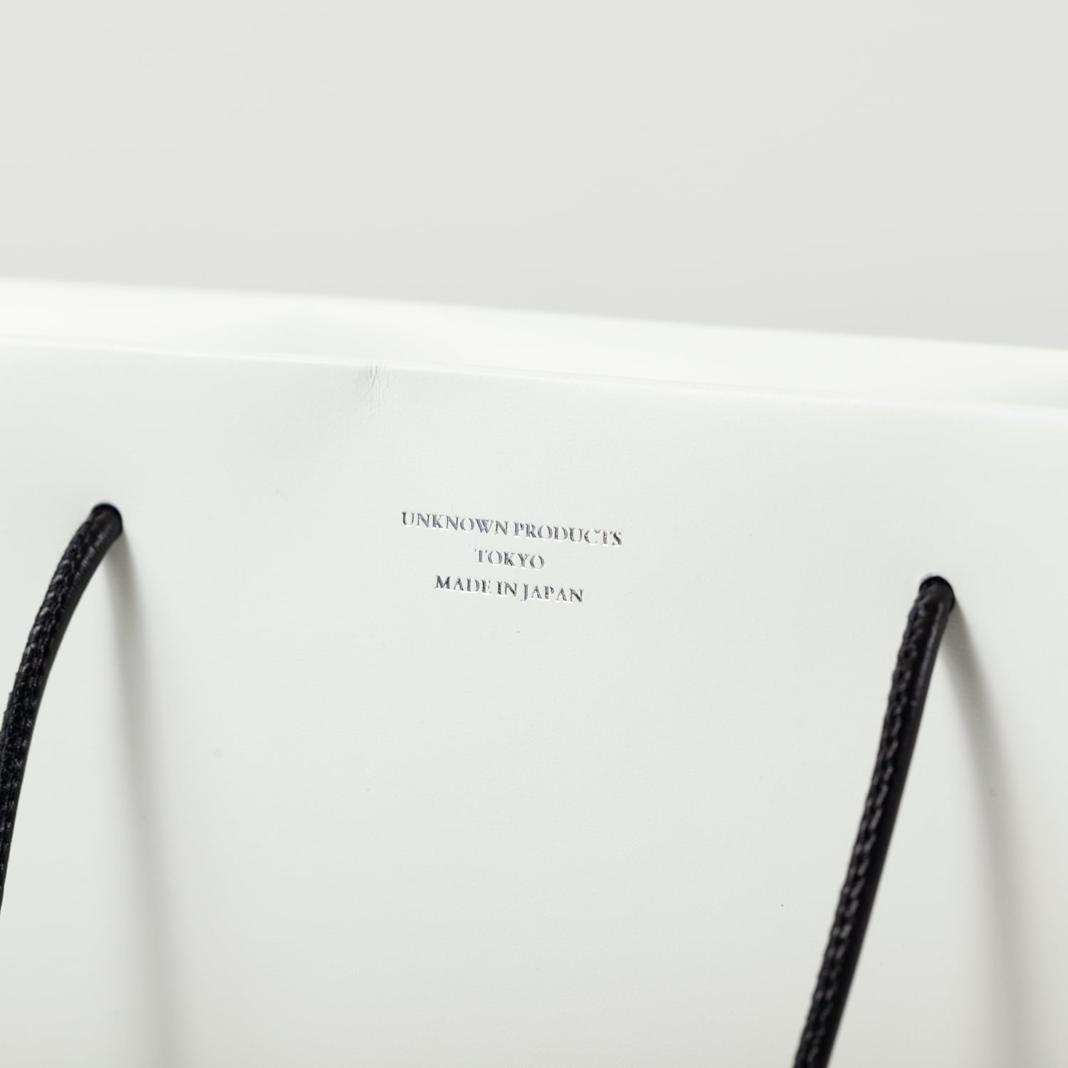 Leather Paper Bag L - White | UNKNOWN PRODUCTS（アンノウン