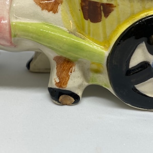 VINTAGE cow car vase