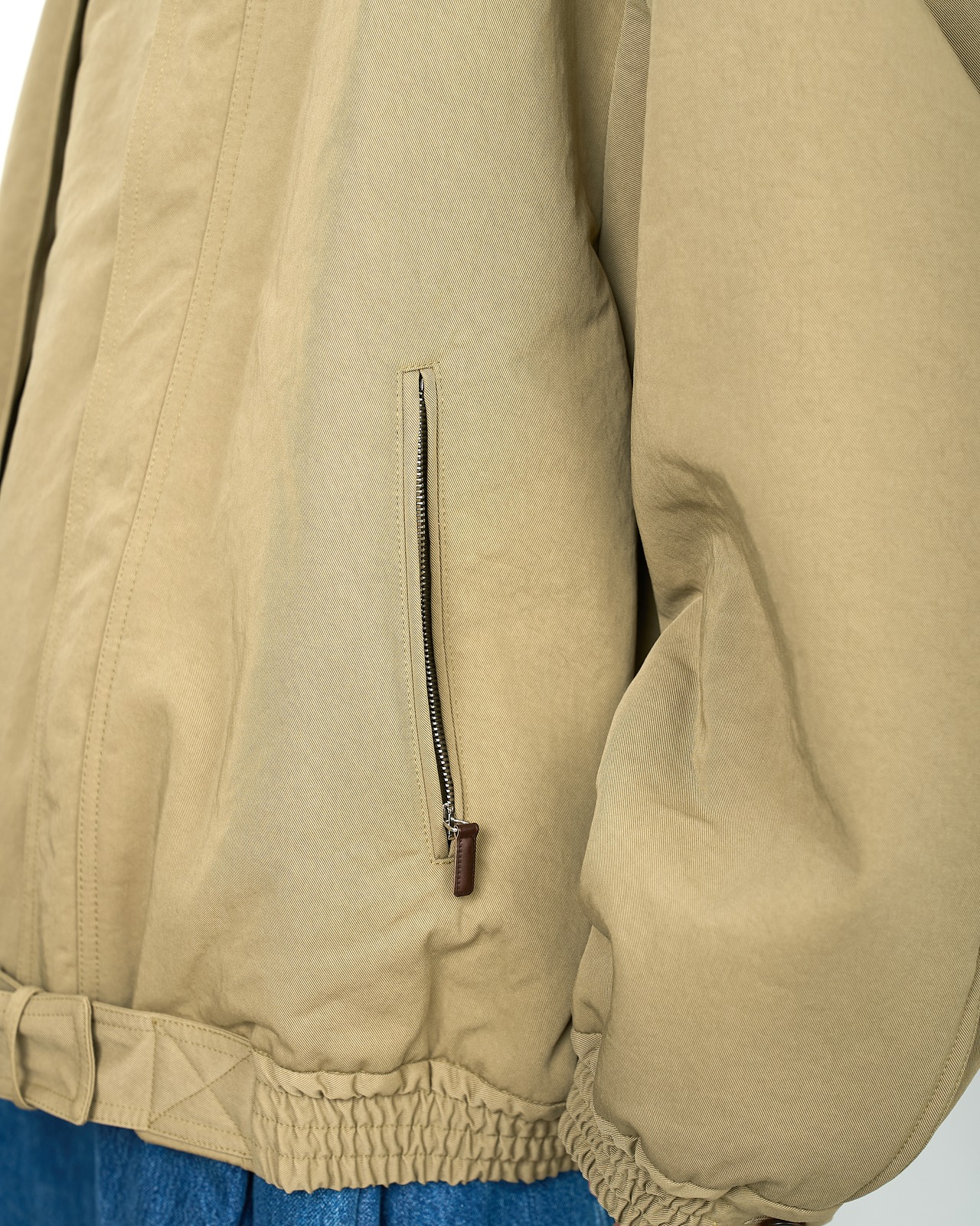 HED MAYNER "HIGH NECK ZIP UP BLOUSON 〔KHAKI〕"