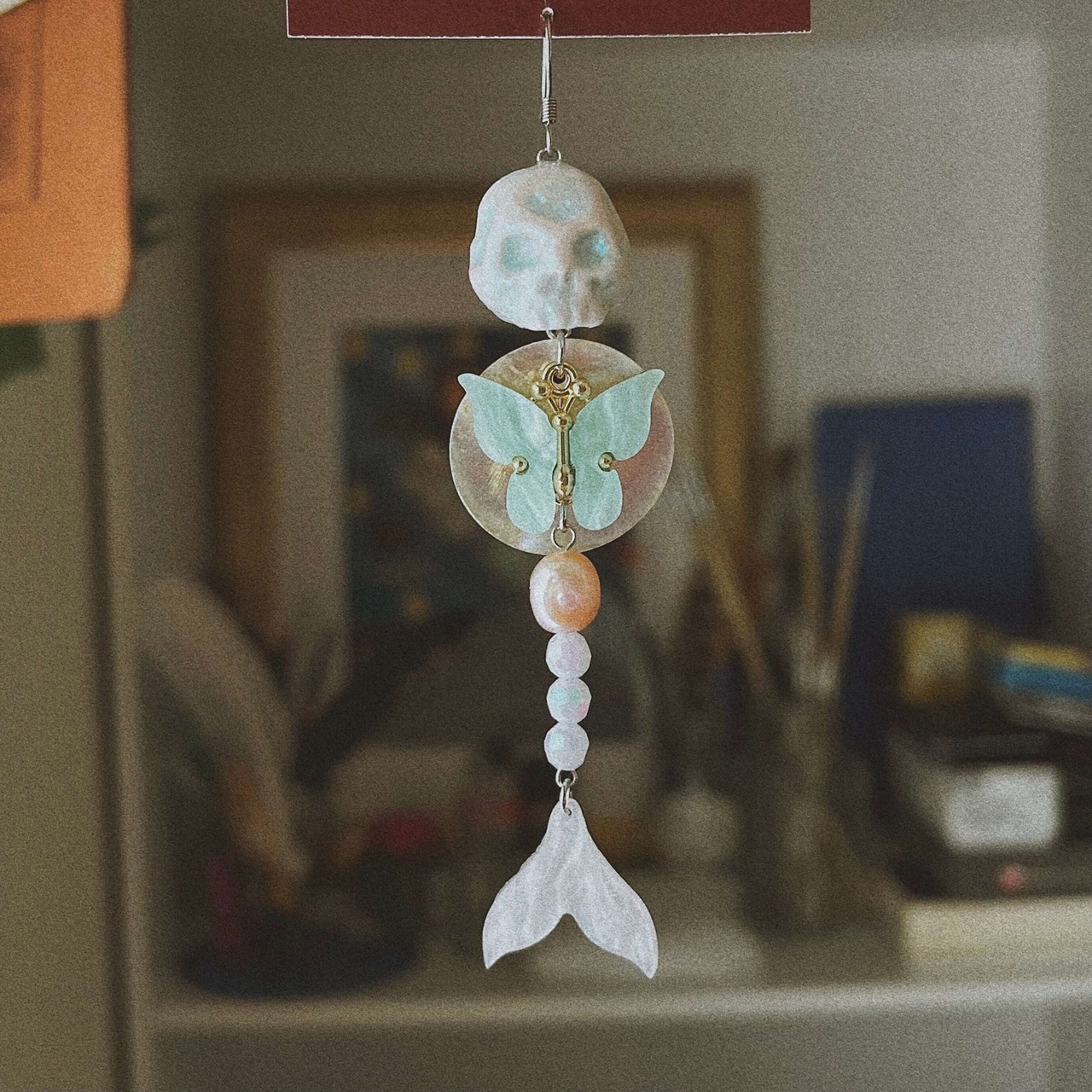 Mermaid remains and butterfly