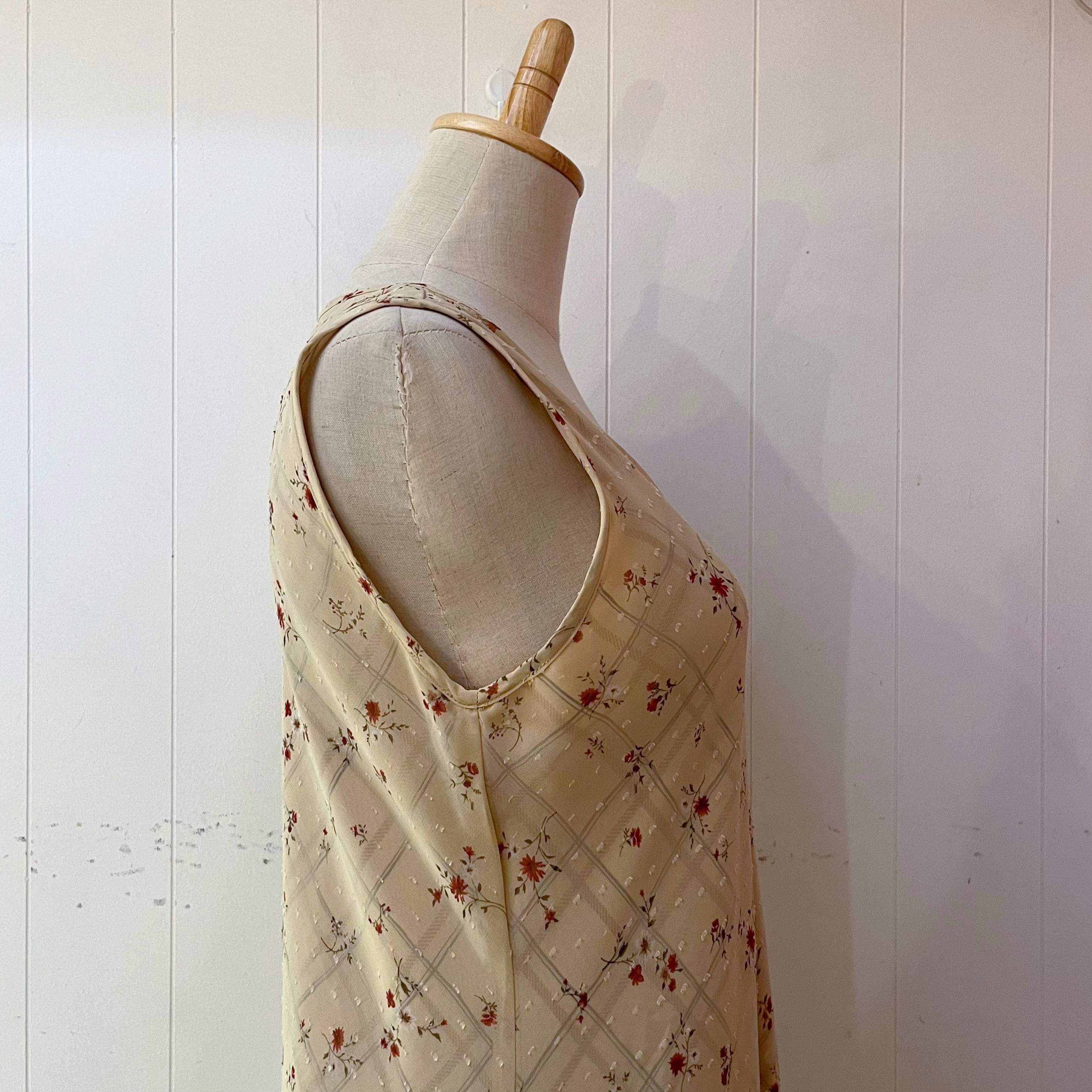 flower check sleeve less one-piece