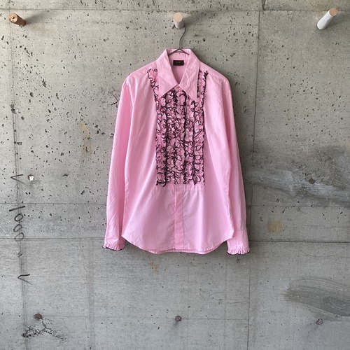 pink ruffle shirt