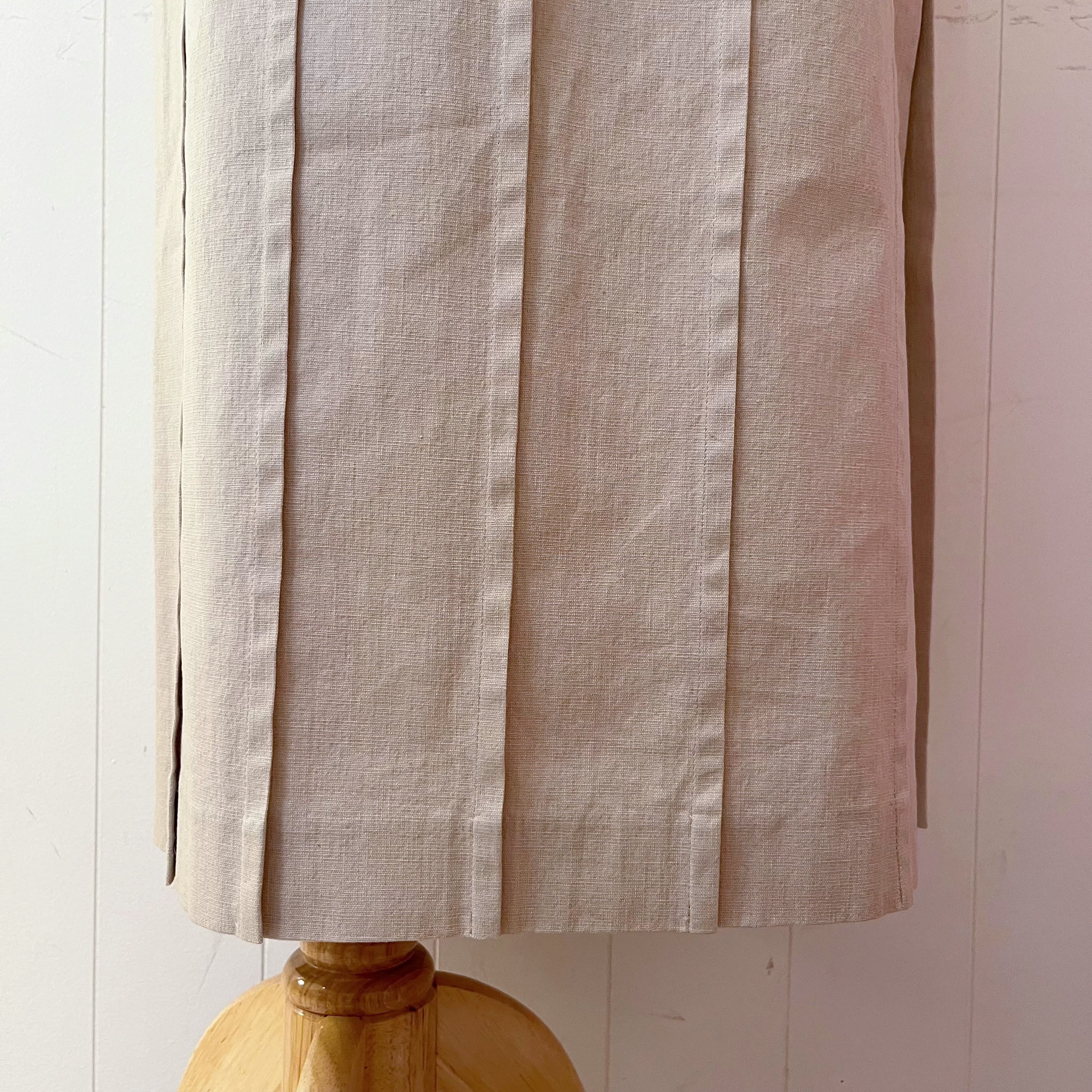 beige pleats side slit long skirt