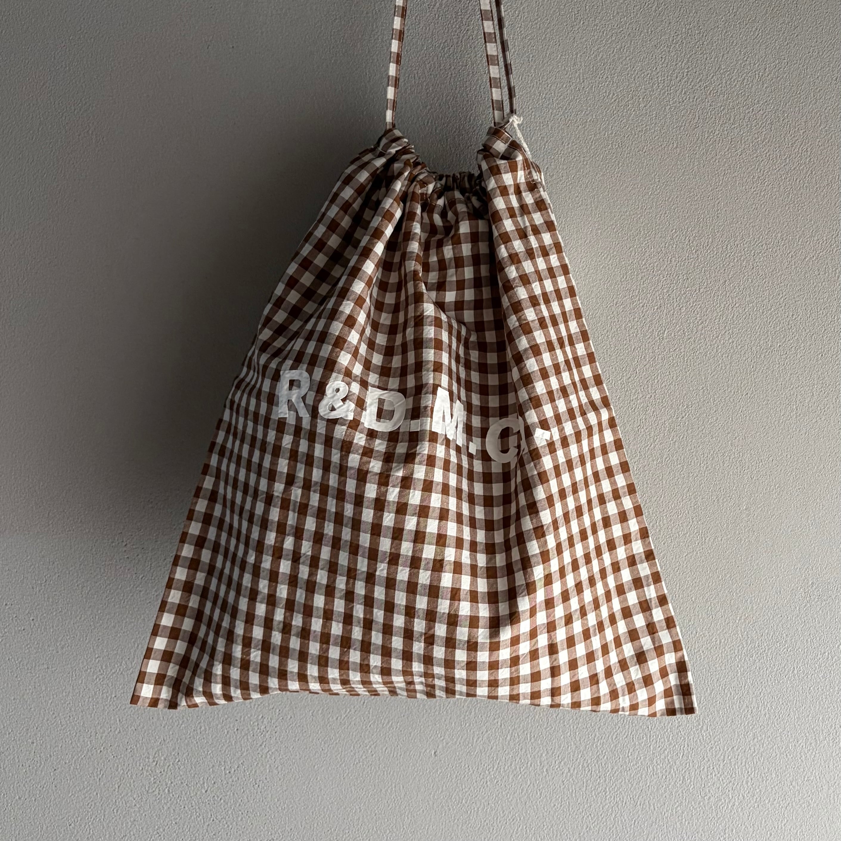 R&D.M.Co-/OLDMAN'S TAILOR オールドマンズテーラー DRAWSTRING BAG L / ギンガムチェックドローストリングバックL #8069 BROWN