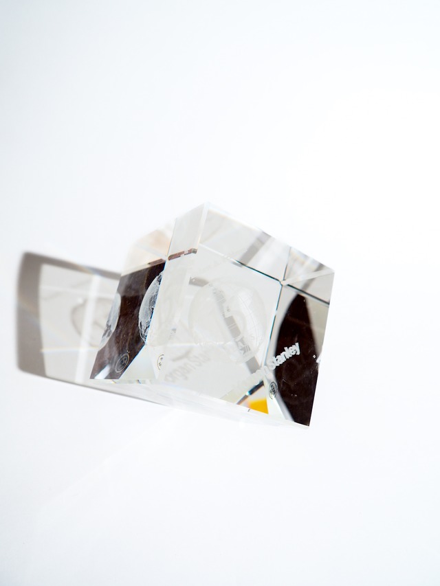 A big glass object containing the Earth
