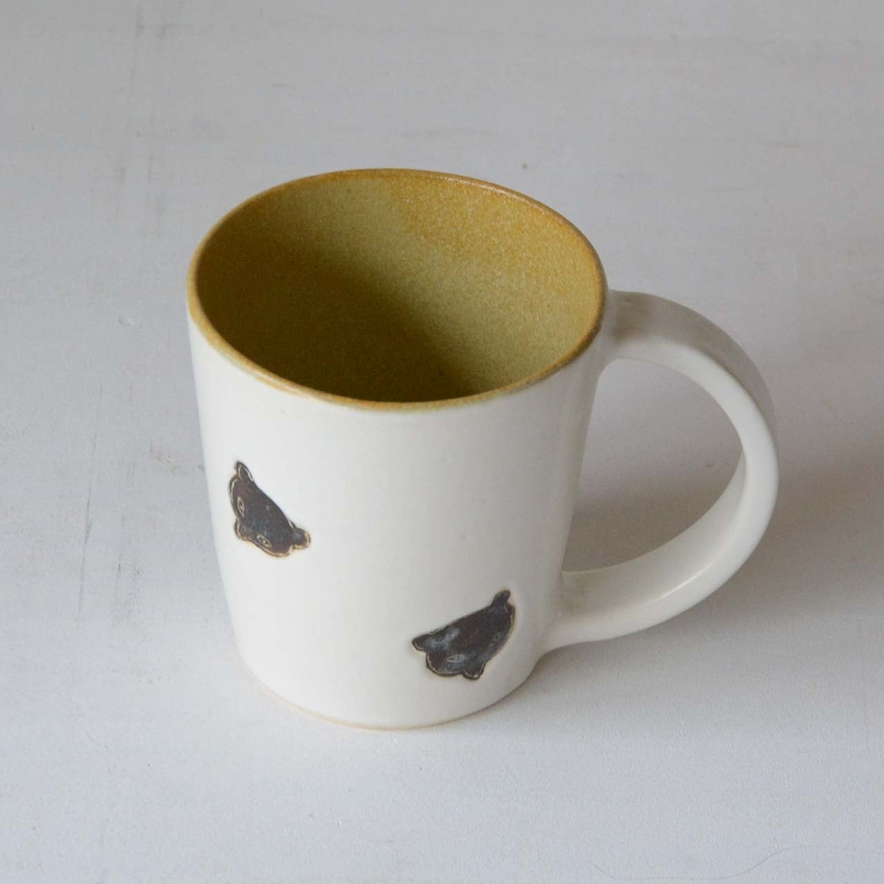 長﨑絢 マグカップ 熊顔（24-018-B） | MIGO LABO