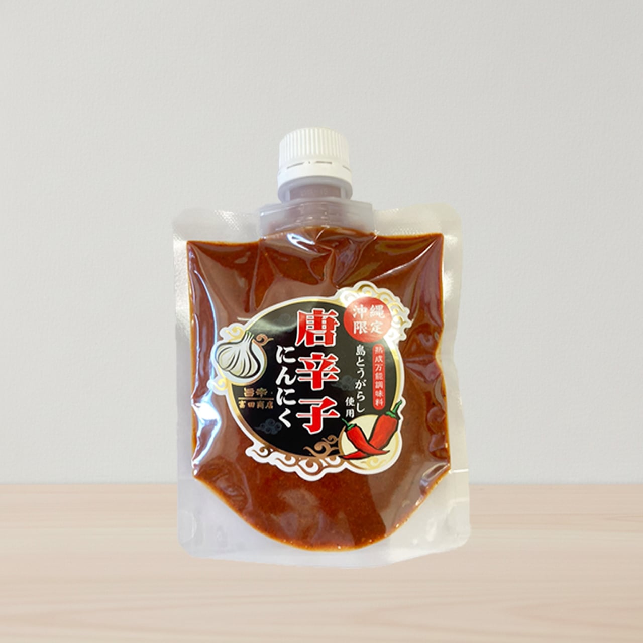 沖縄限定 唐辛子にんにく ペースト 150g パウチタイプ 富田商店 島唐辛子 国産 スパイス 激辛 (※ご注文日から1~3営業日で発送いたします)
